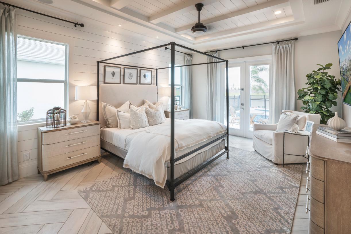 Expansive primary bedroom suite with access to rear lanai