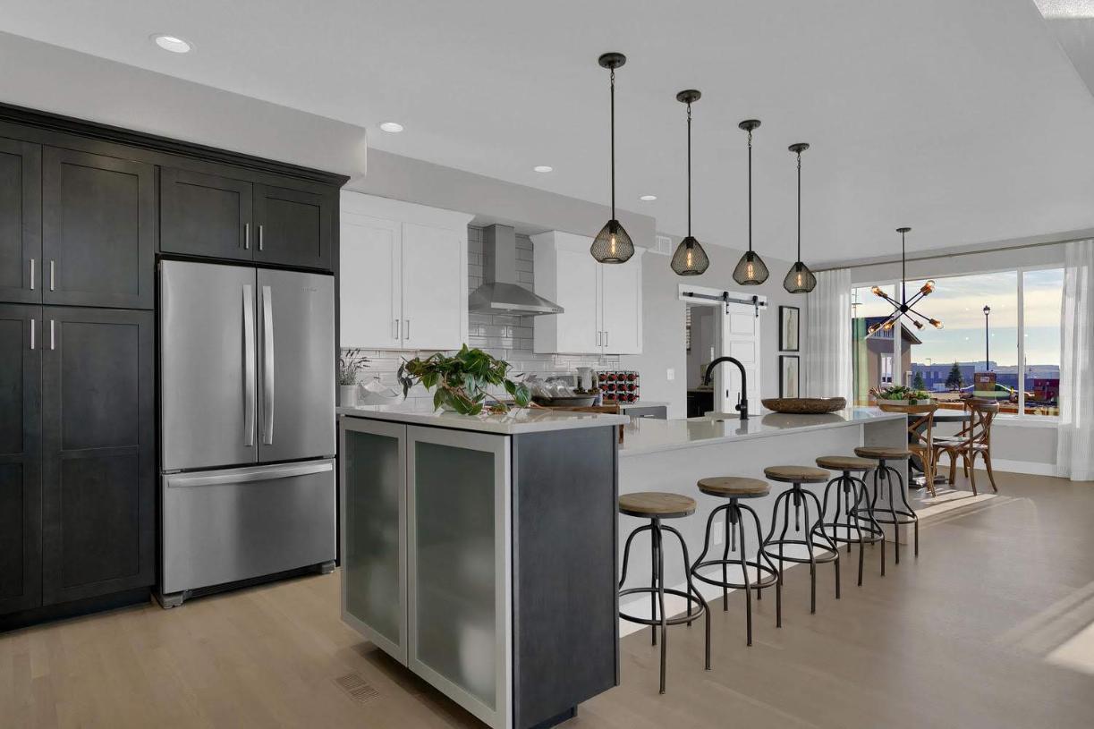 Ample storage space is provided in this kitchen with an abundance of cabinetry space