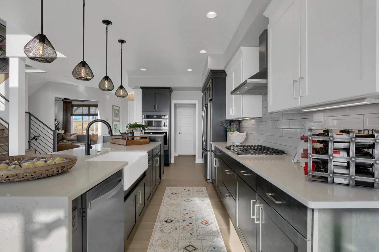 The kitchen provides adequate room for many people to cook and gather around