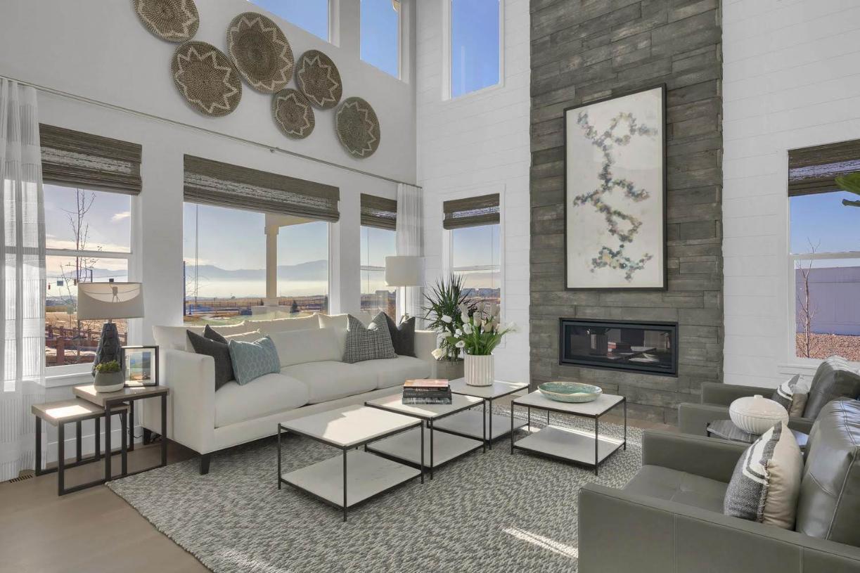 The Colorado sunshine floods the two-story great room through the numerous windows