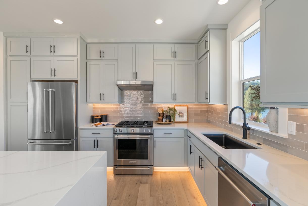 Double-stacked upper cabinets provide additional storage