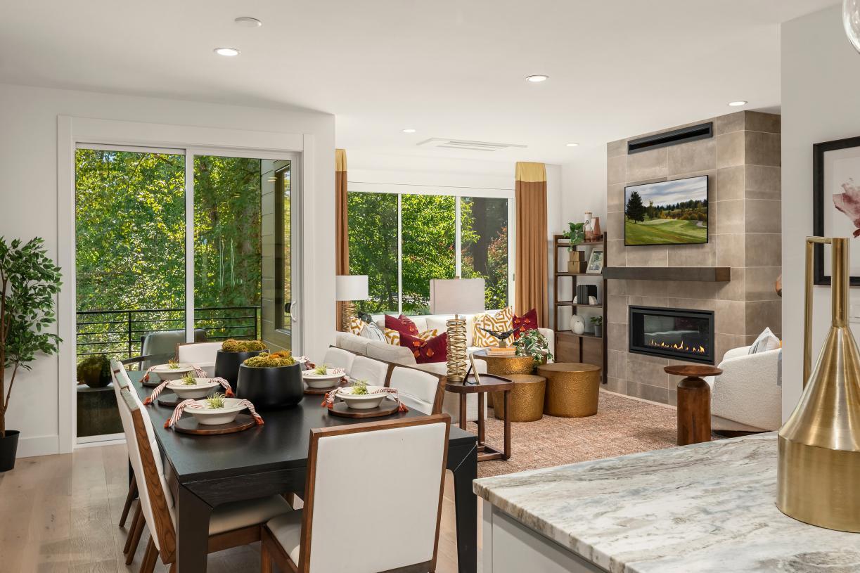 Views of the great room and greenbelt from the kitchen