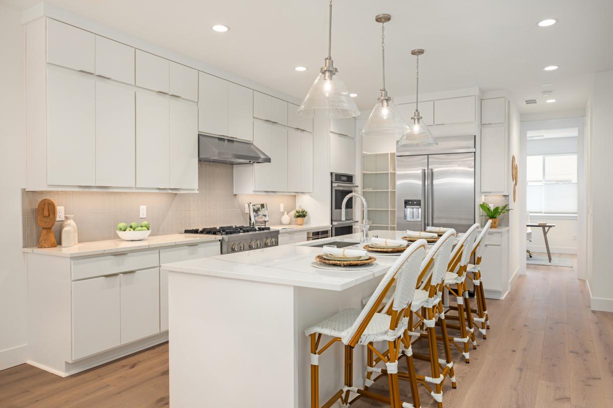 Kitchen island with breakfast bar offers seating for four