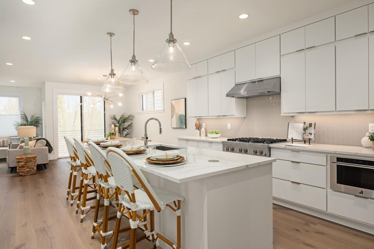 Kitchen opens to great room and casual dining area