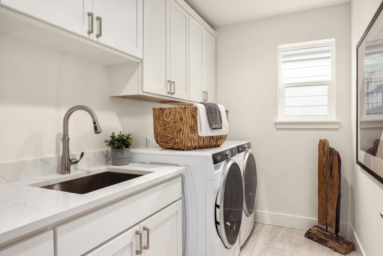 Laundry is conveniently located on the same floor as the bedrooms