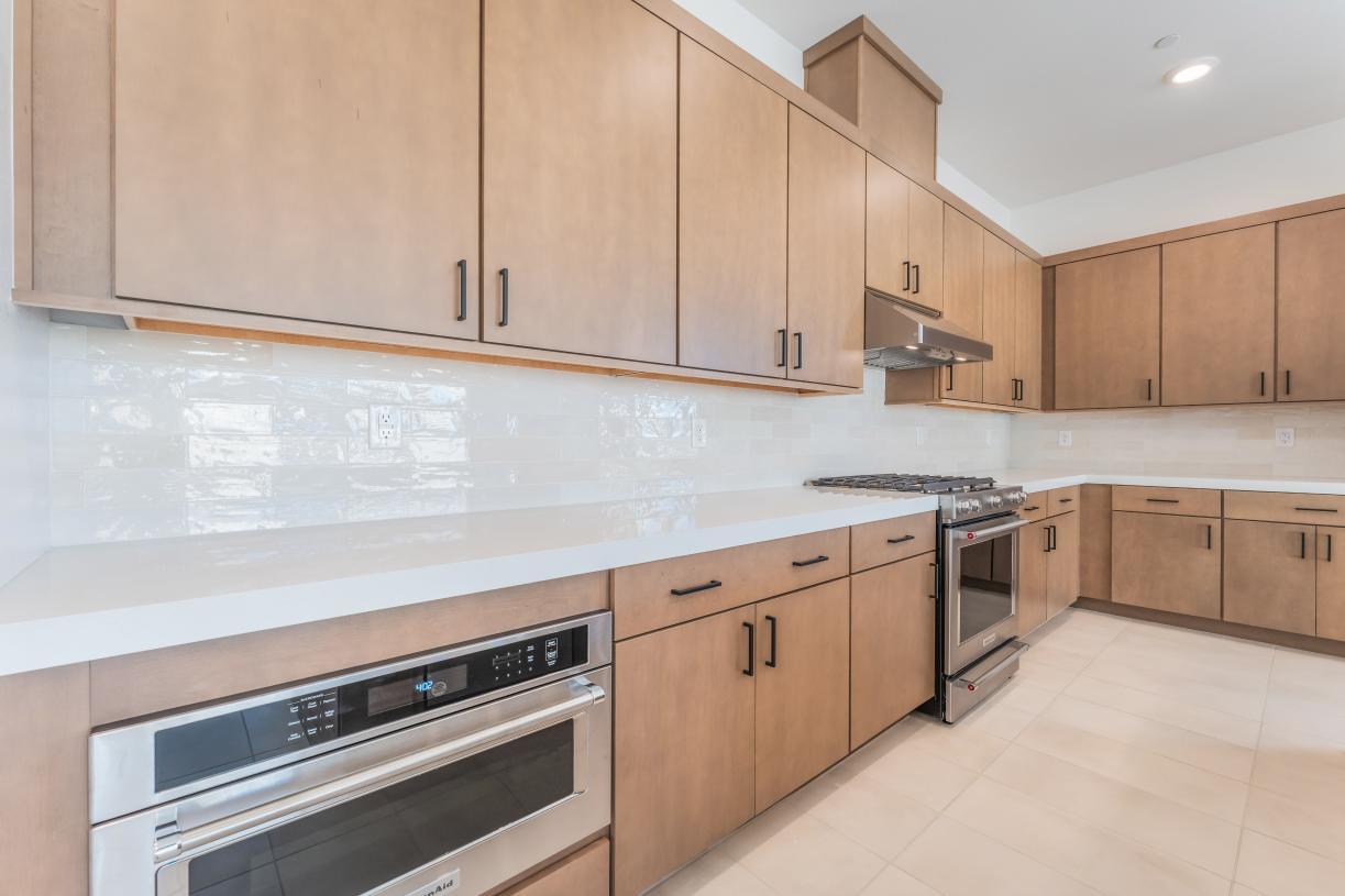 Upgraded hard surface with coordinating subway tile backsplash