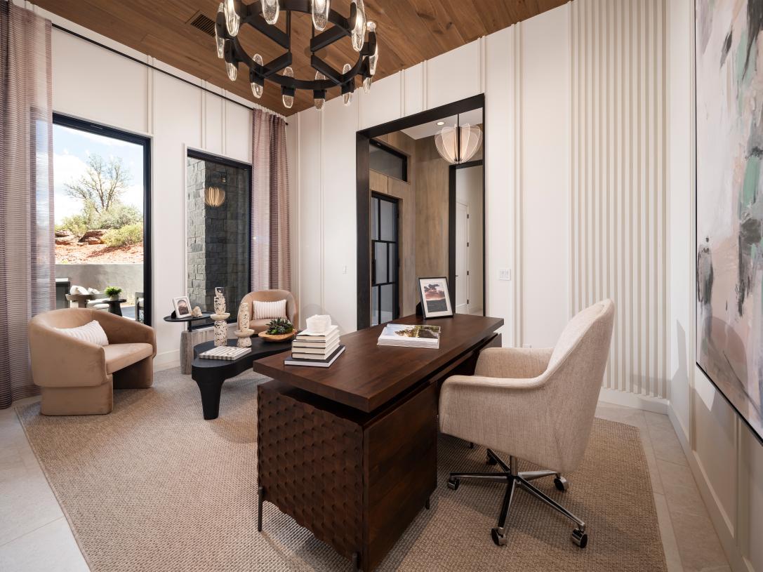 Stunning home office located directly off of the airy foyer