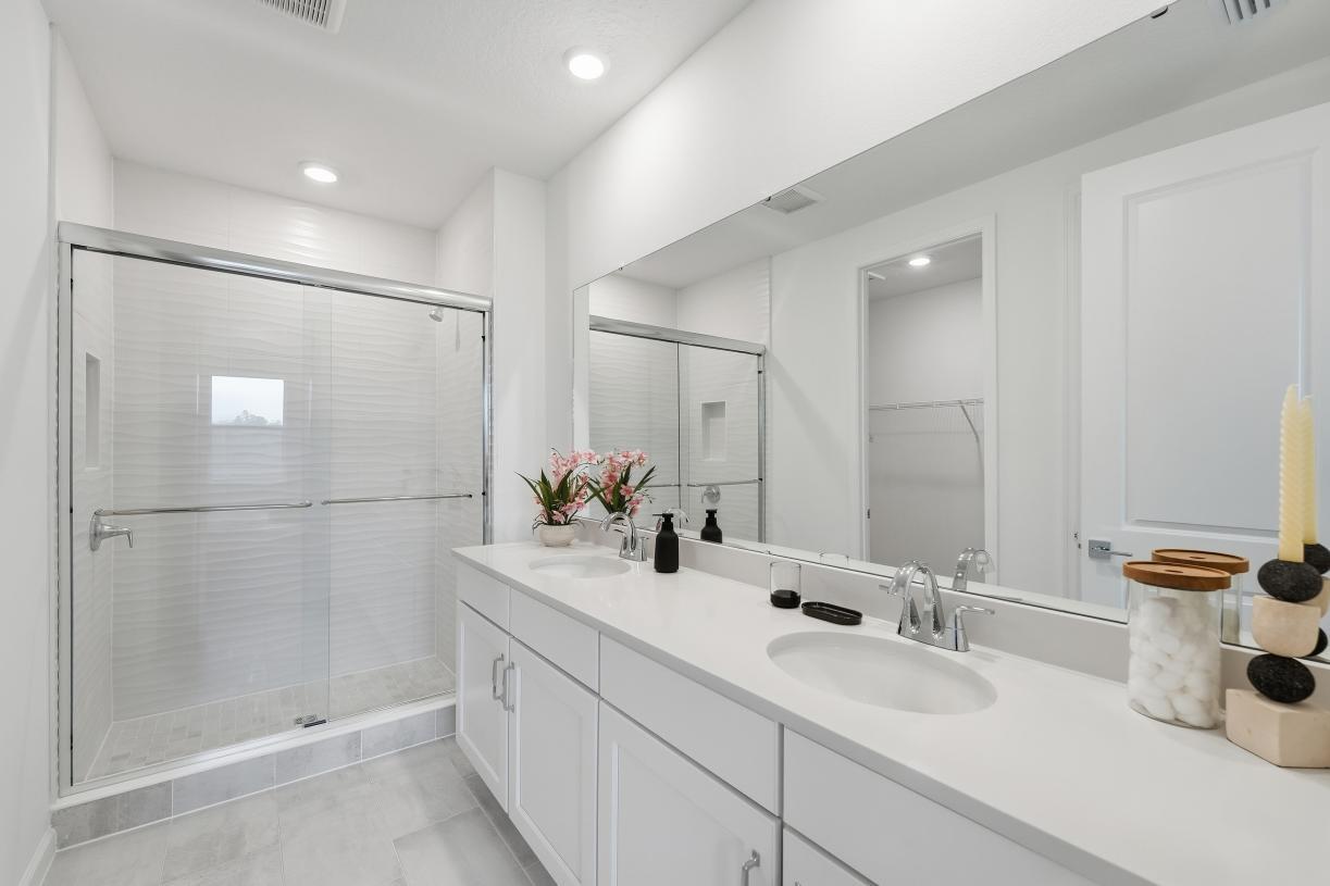 Fresh, clean, and effortlessly modern primary bathroom