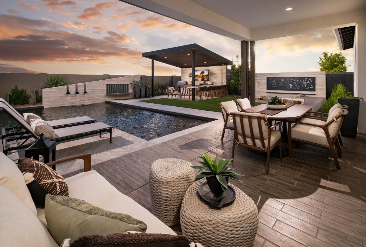 Beautiful resort-style backyard with pool and outdoor kitchen