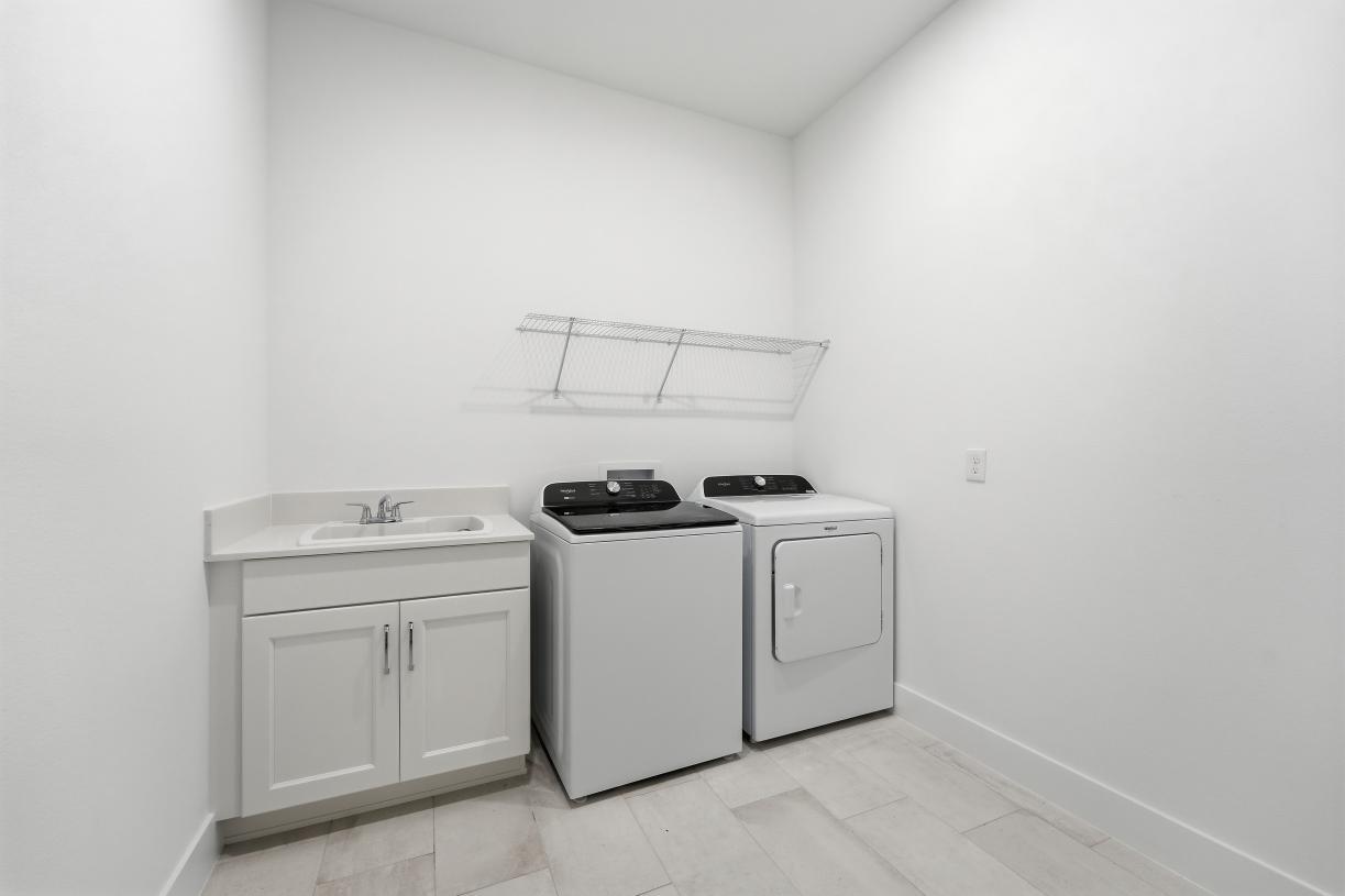 Functional laundry rooms with ample storage and workspace