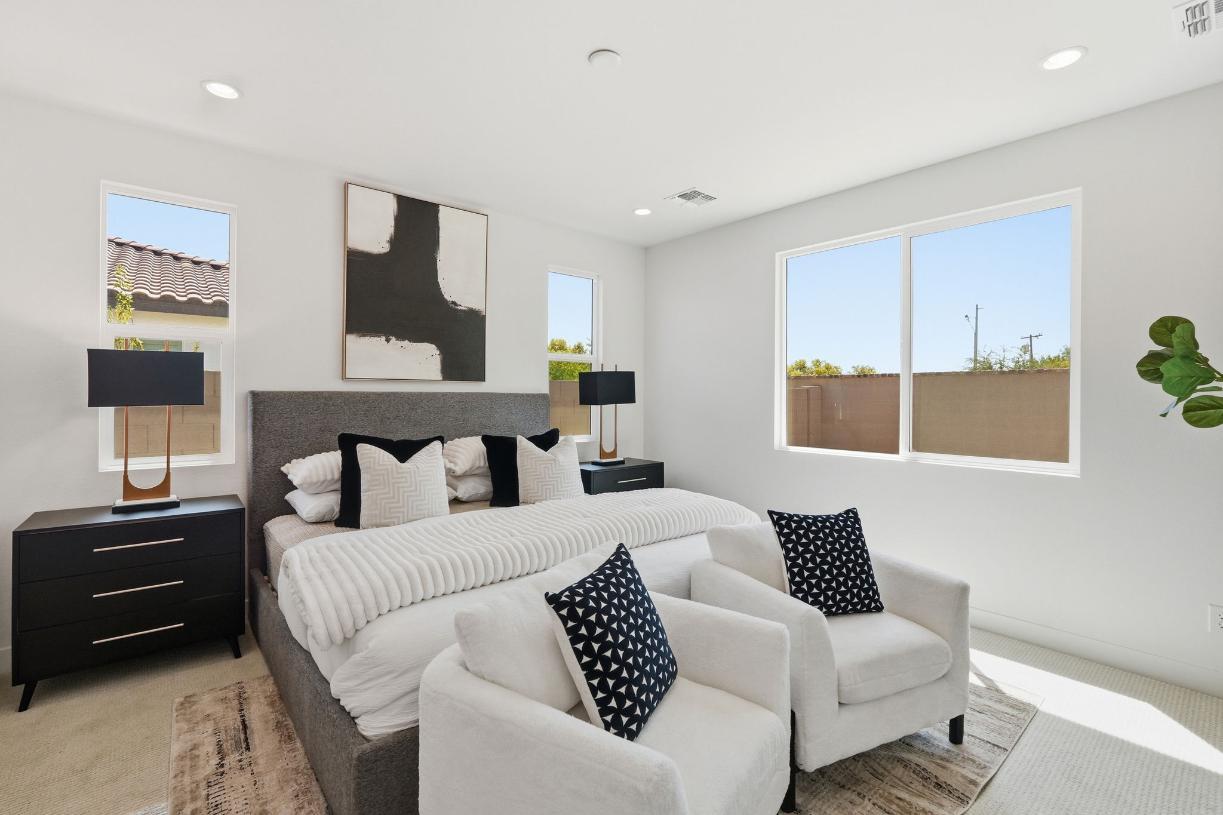 Expansive primary bedroom with luxurious finishes