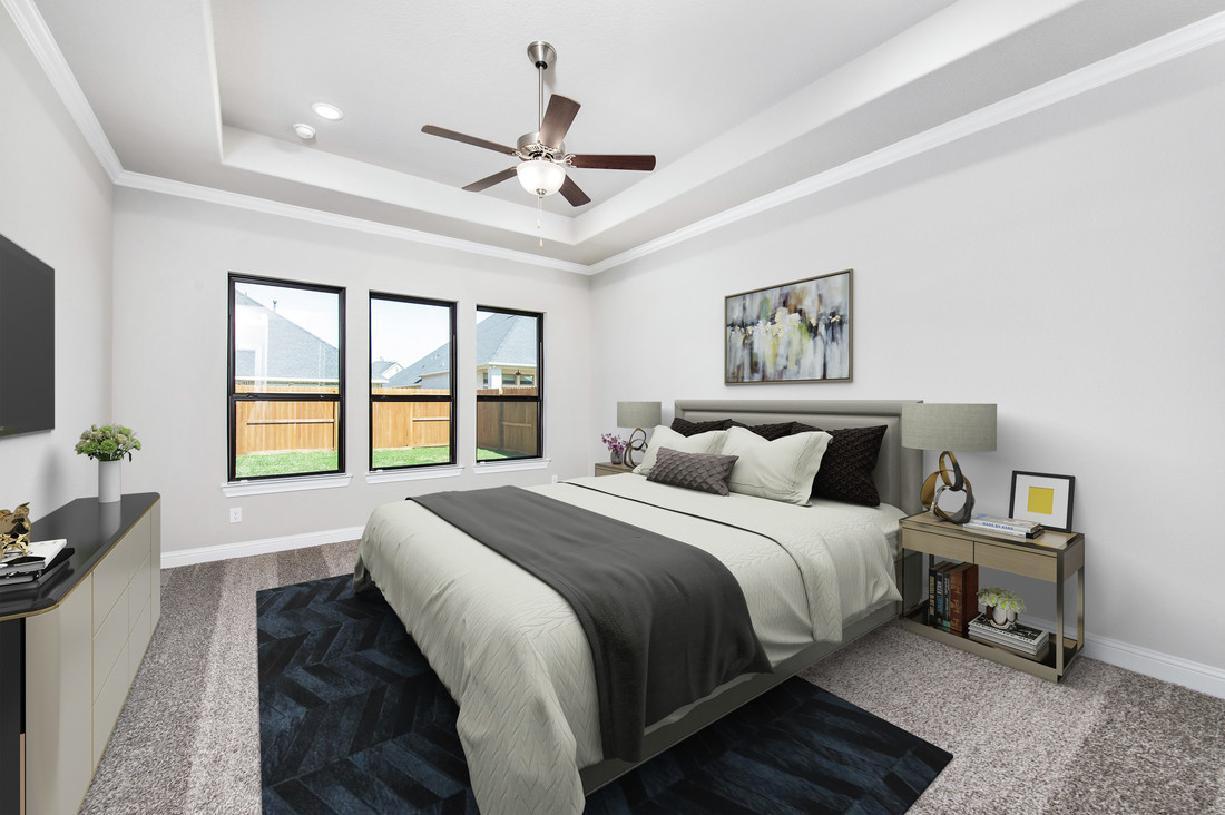 Luxurious primary bedroom suite