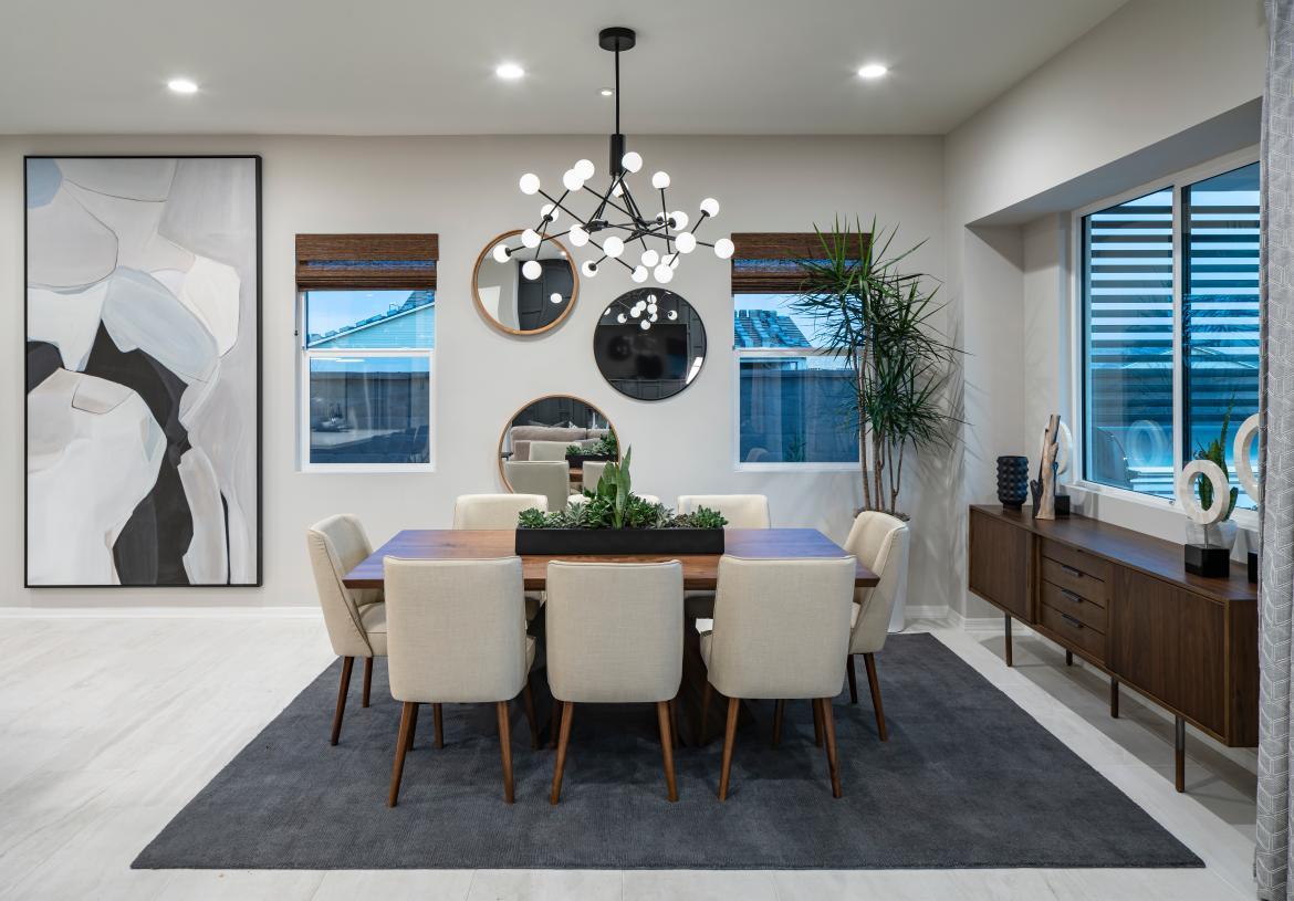 Casual dining space overlooks the large covered patio and beyond