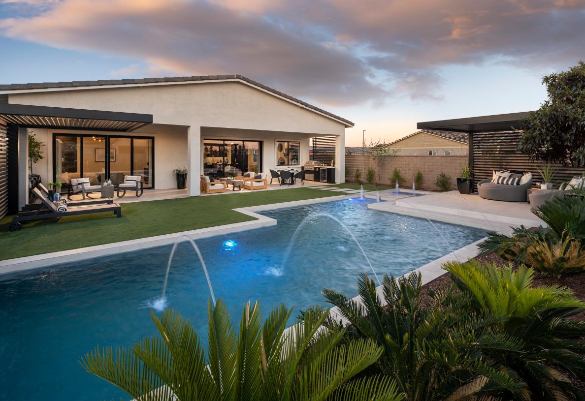 Resort-style backyard with pool and outdoor kitchen