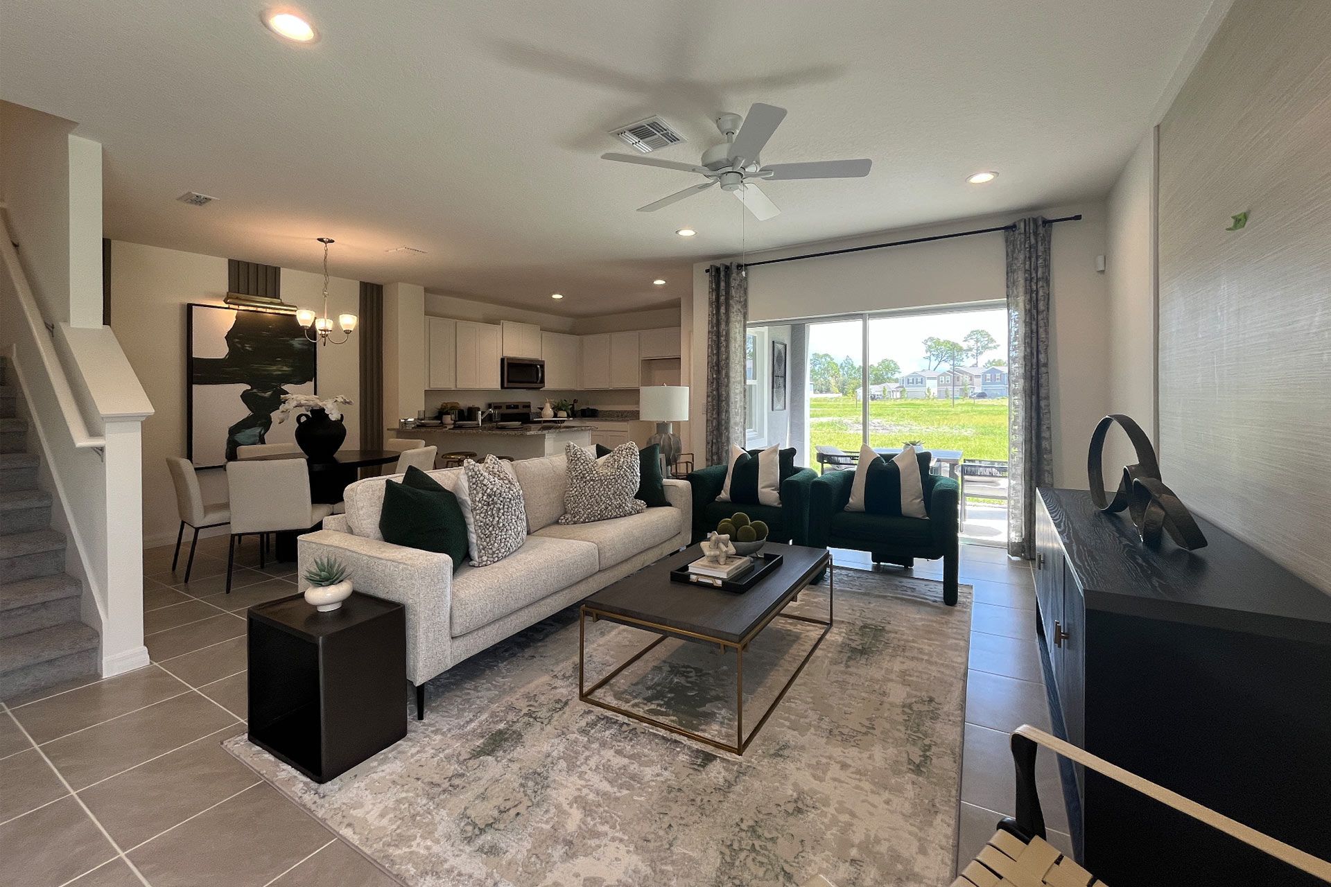 Ashley townhome exterior with covered porch in Pine Meadows, new construction in Eustis FL