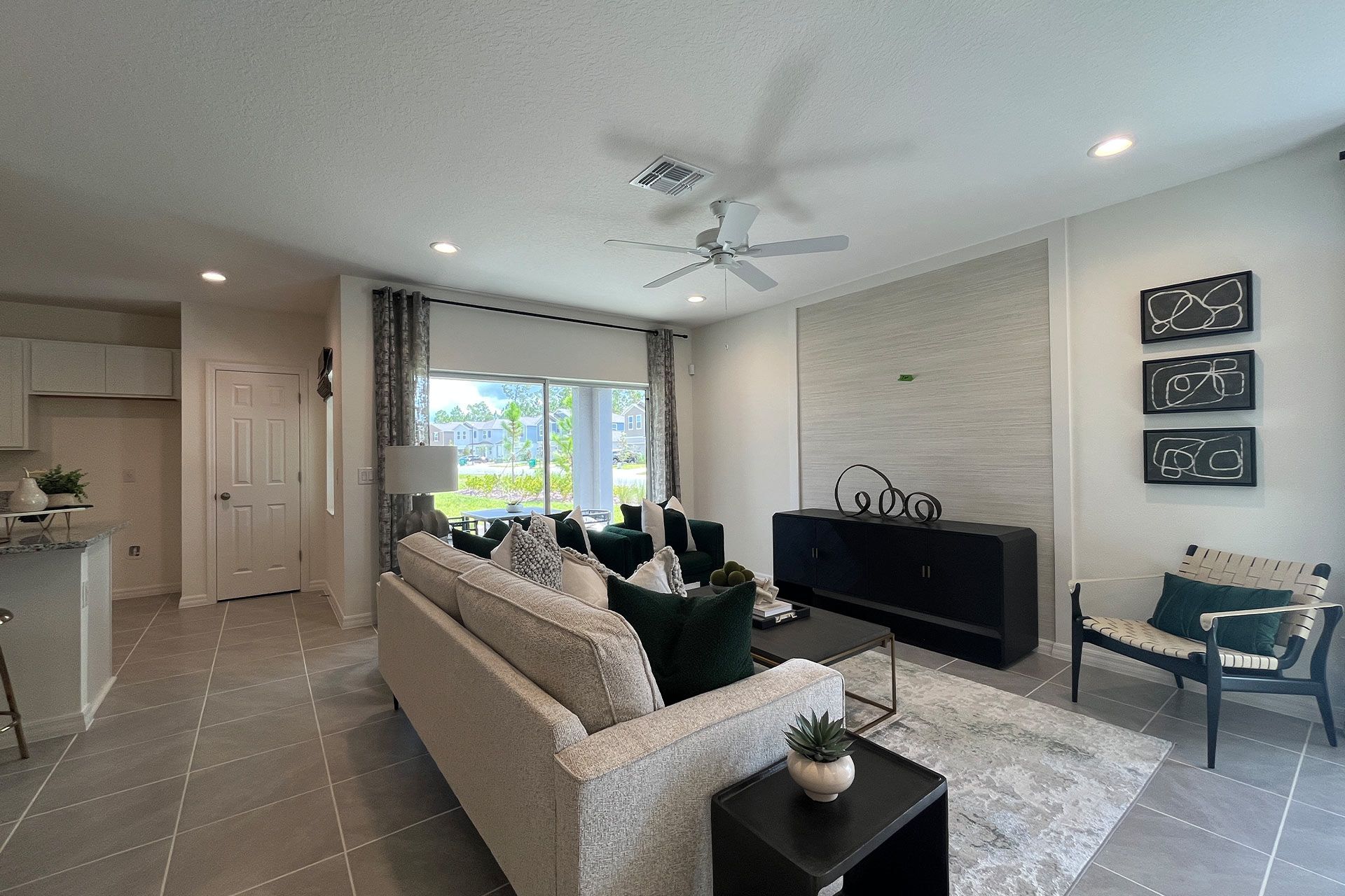 Ashley townhome exterior with covered porch in Pine Meadows, new construction in Eustis FL