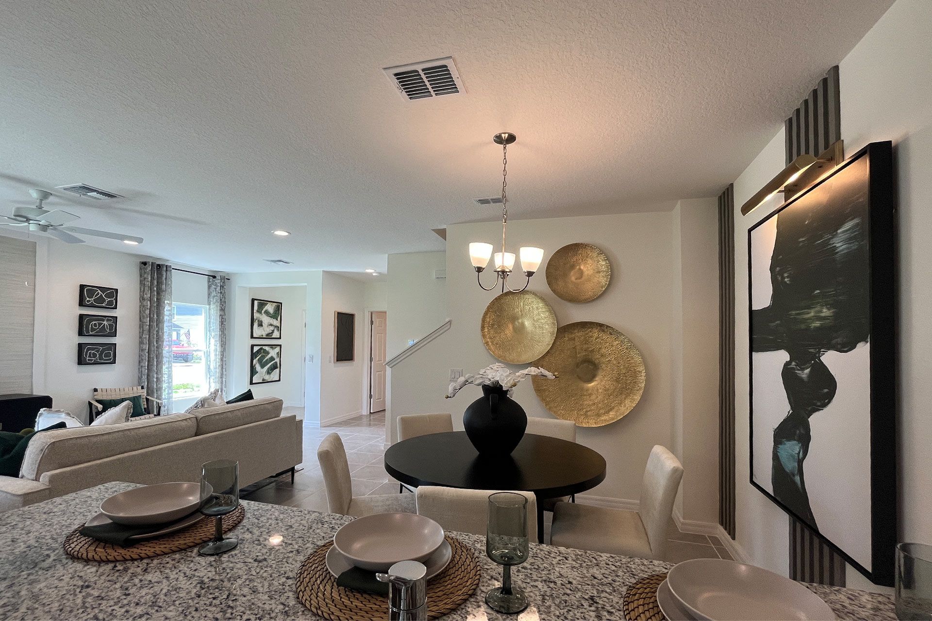 Ashley townhome exterior with covered porch in Pine Meadows, new construction in Eustis FL