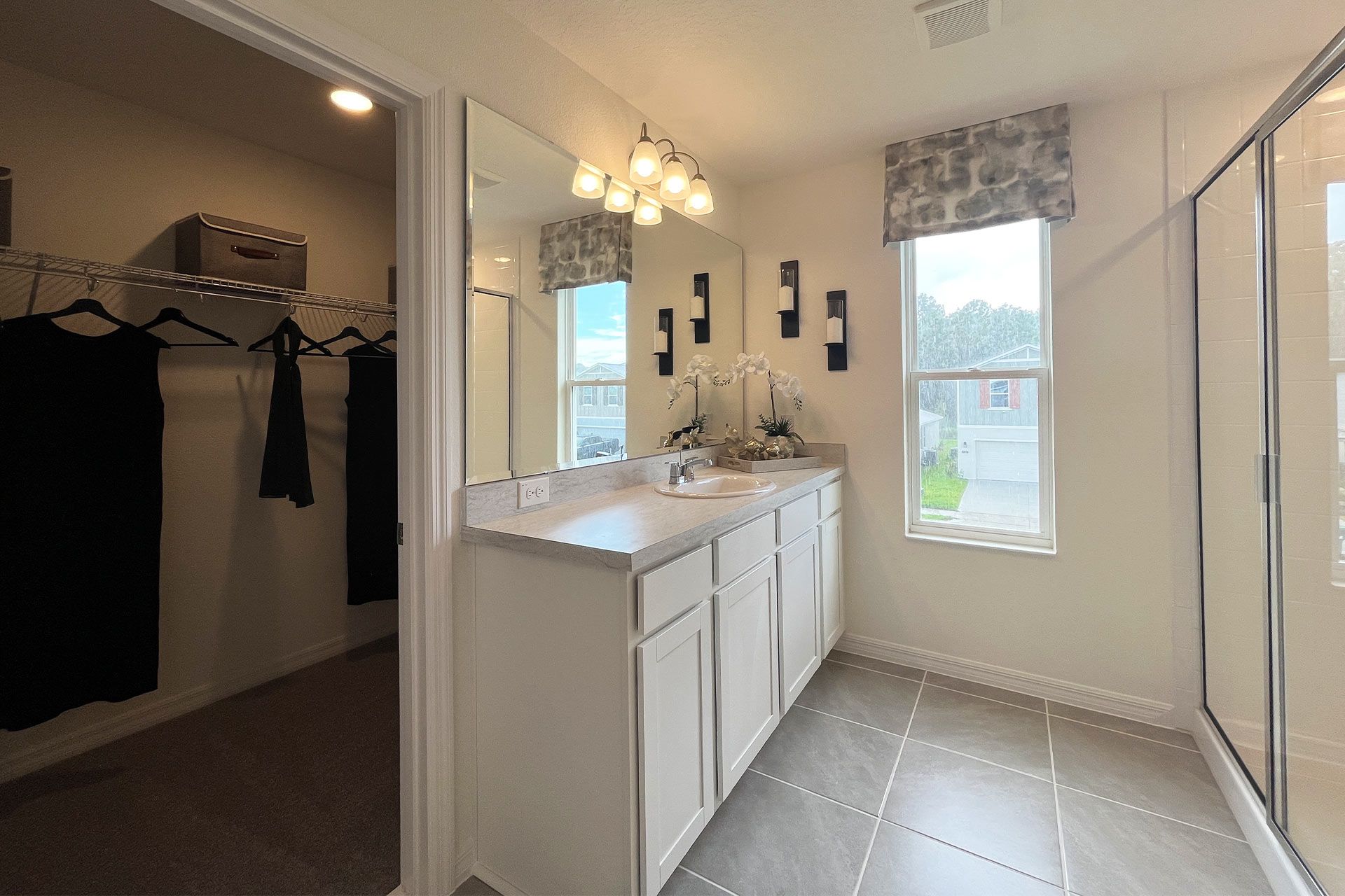 Ashley townhome exterior with covered porch in Pine Meadows, new construction in Eustis FL