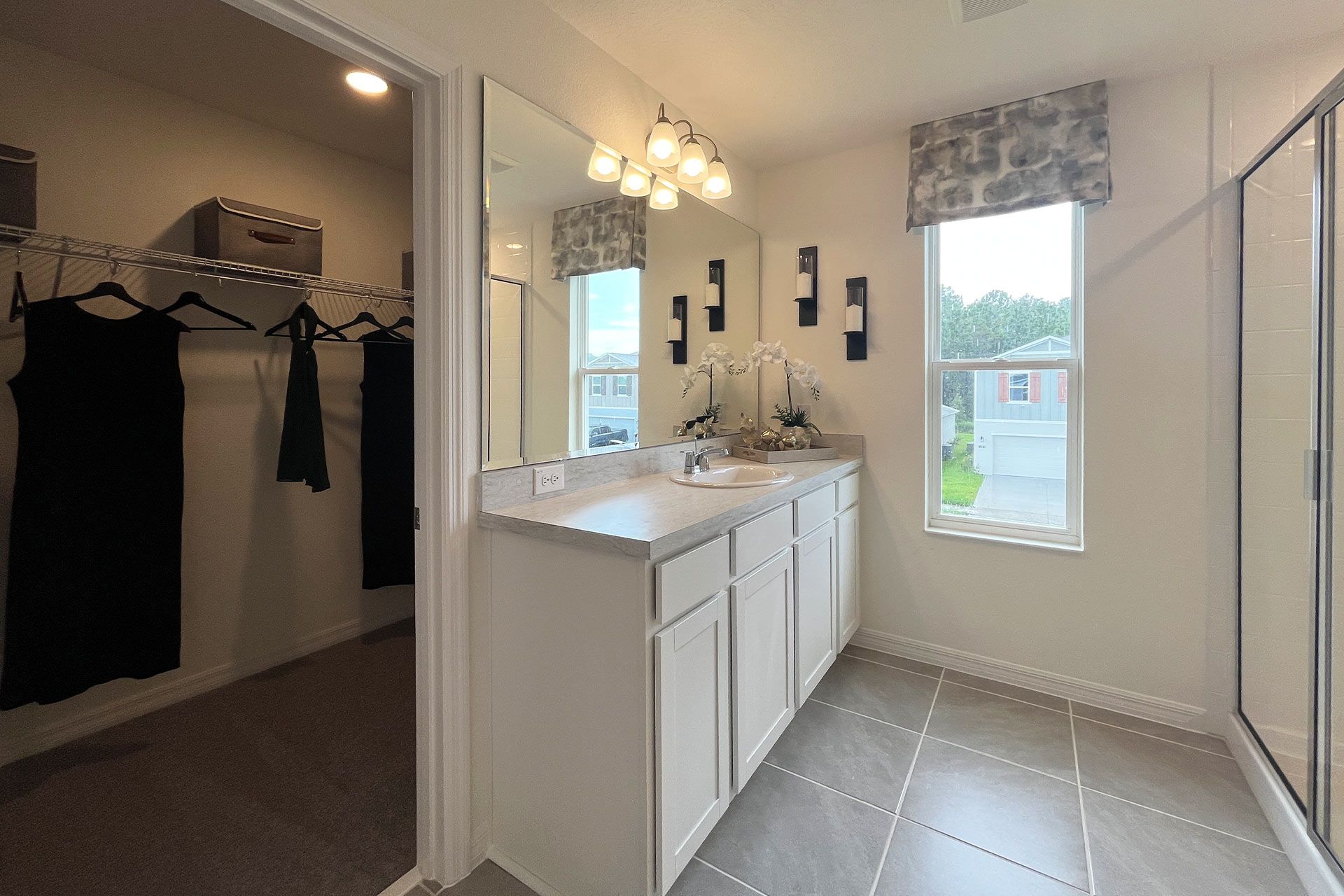 Ashley townhome exterior with covered porch in Pine Meadows, new construction in Eustis FL