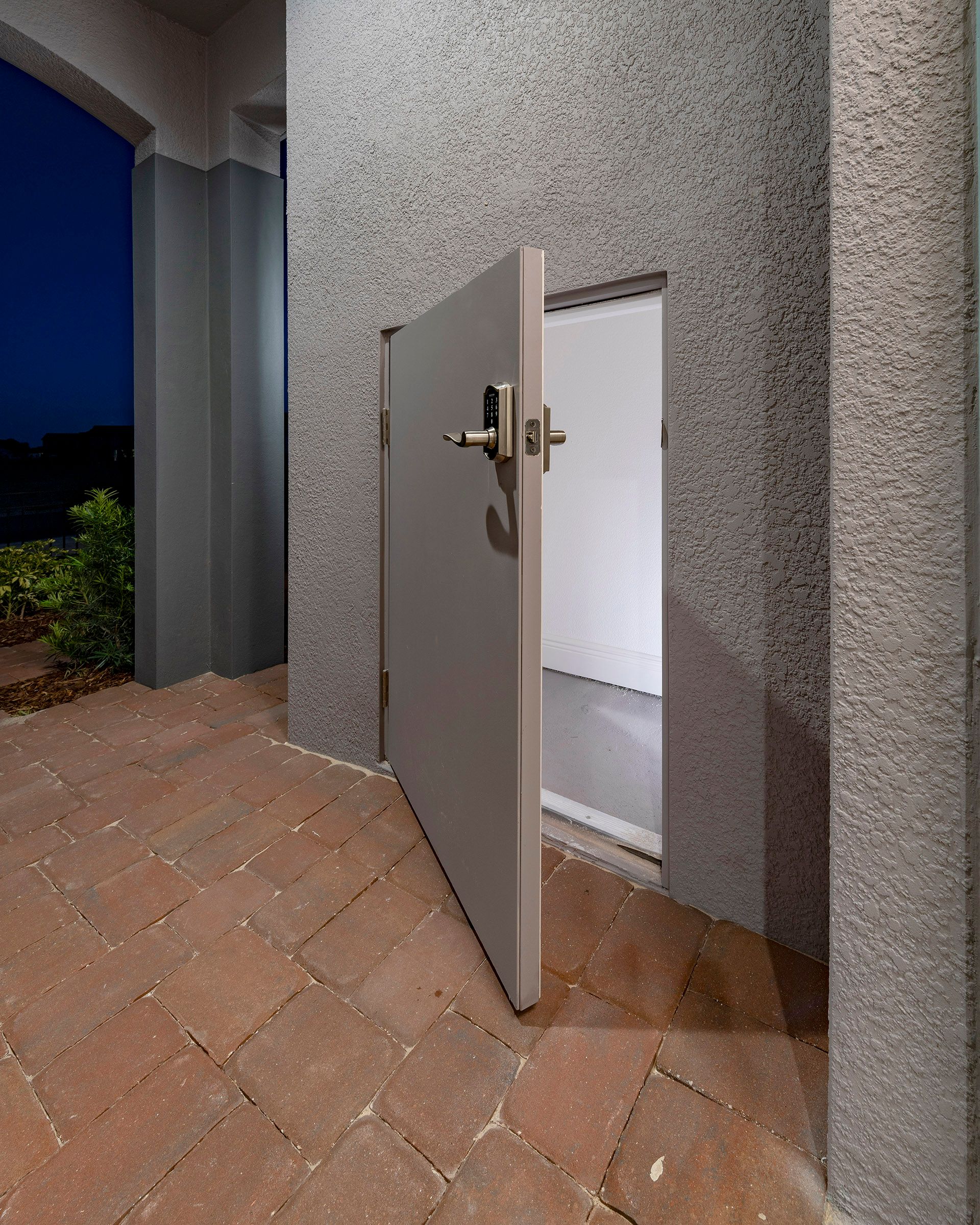 Sims Trinity Package Place outdoor storage area with secure delivery door and electronic keypad door lock