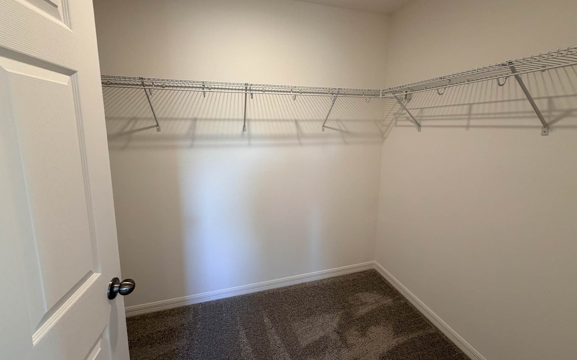 Spacious Primary Closet with Ample Storage in Central Florida Home