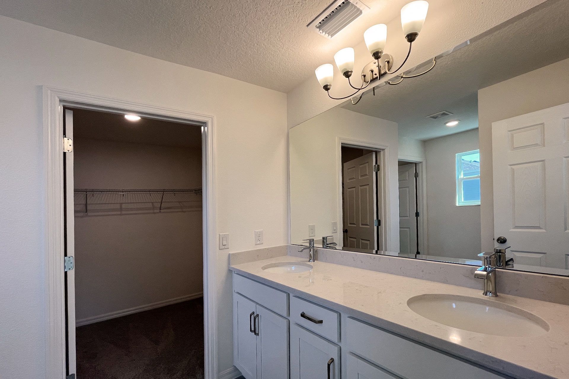 Modern Primary Bathroom with Stylish Features in Central Florida House
