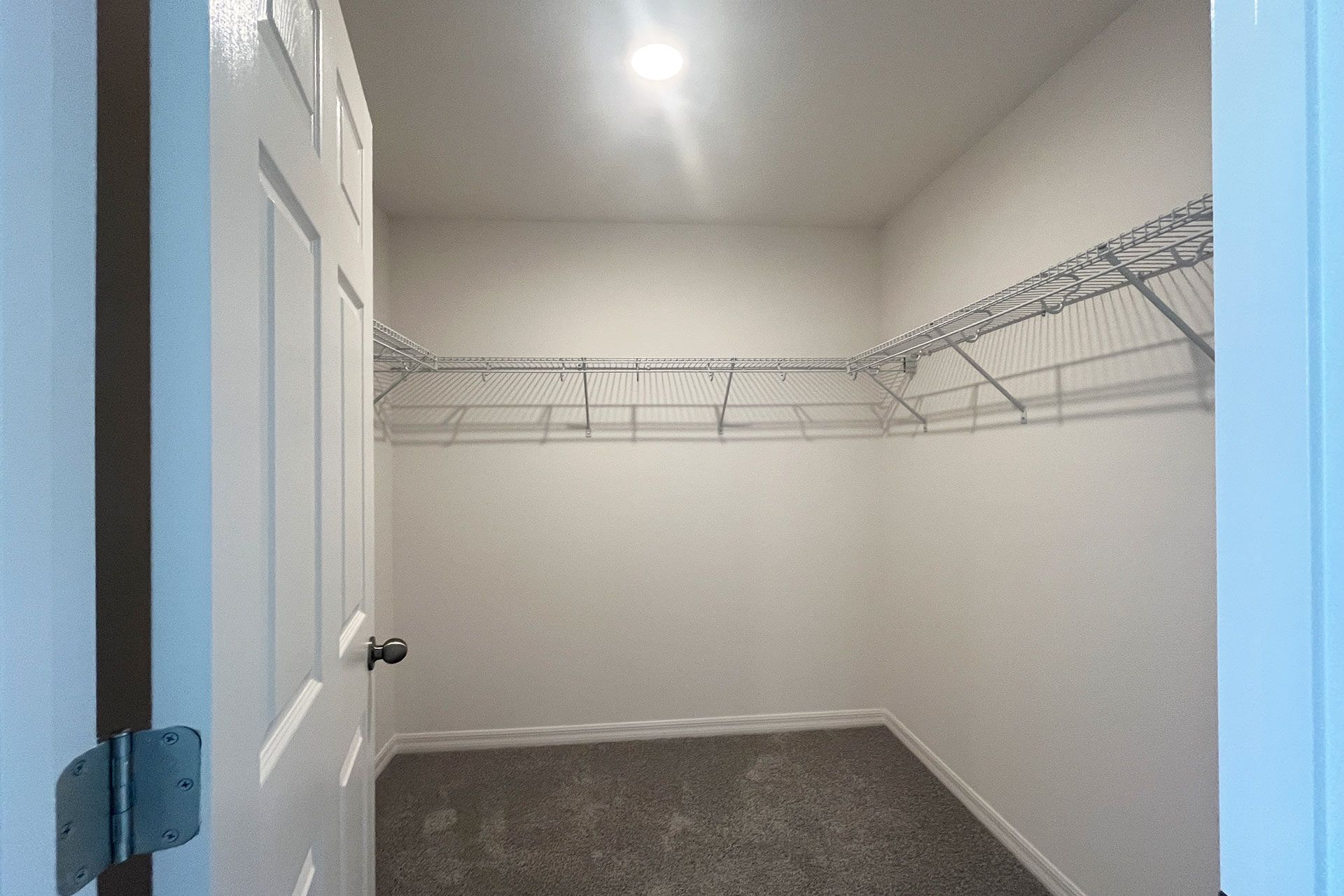 Organized Primary Bedroom Closet in Central Florida House