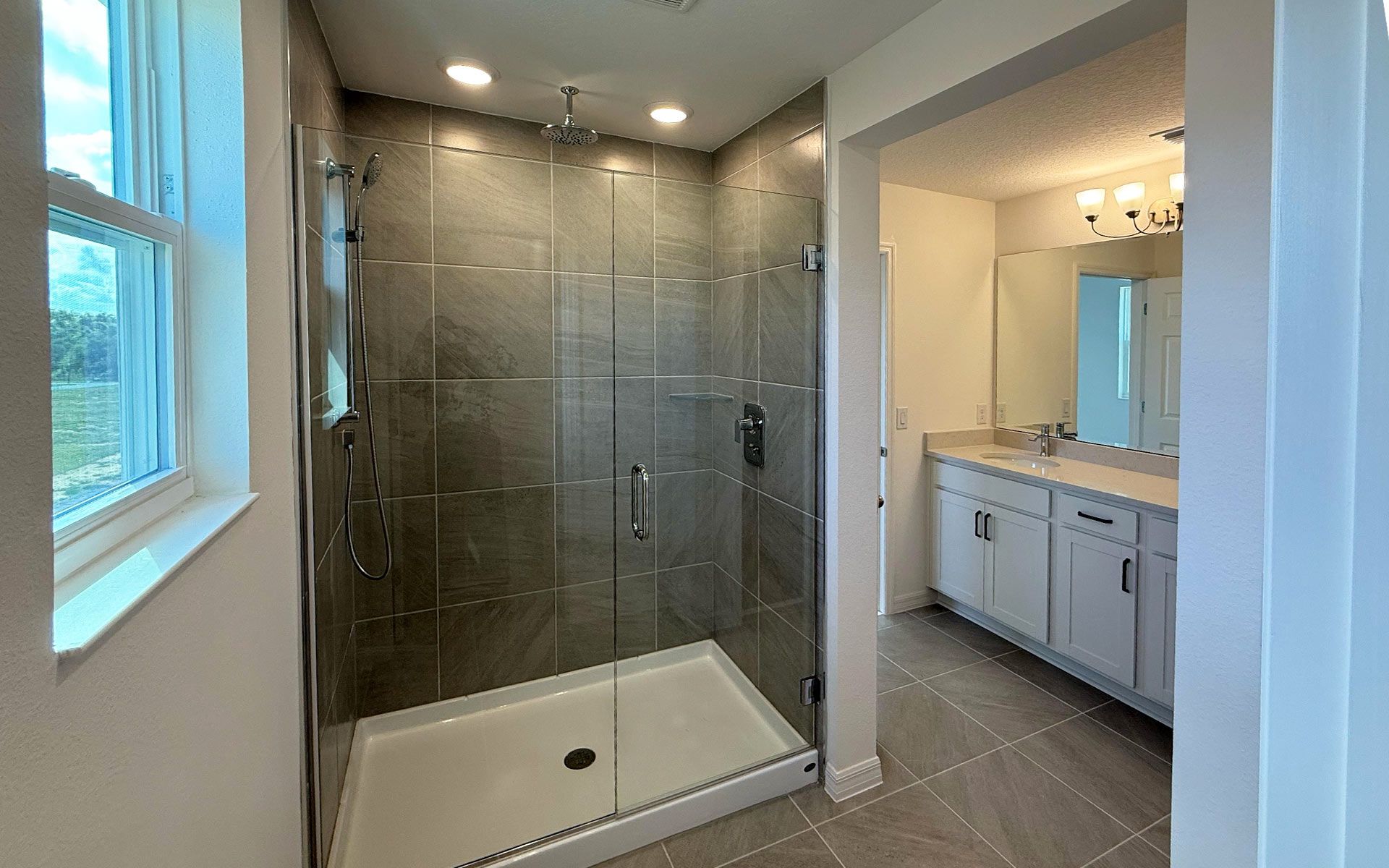Modern Primary Bathroom with Stylish Features in Central Florida House
