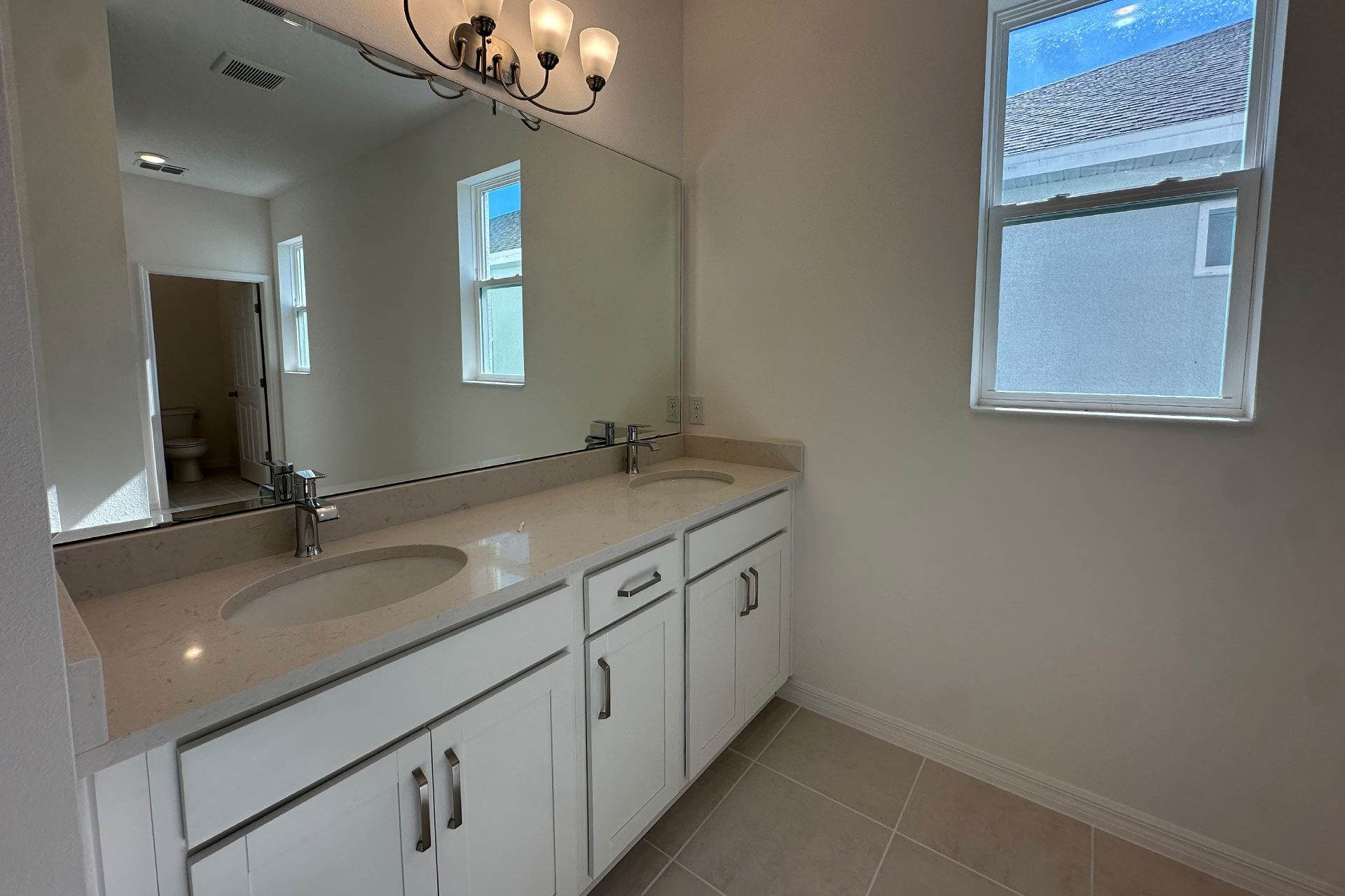 Modern Primary Bathroom with Stylish Features in Central Florida House