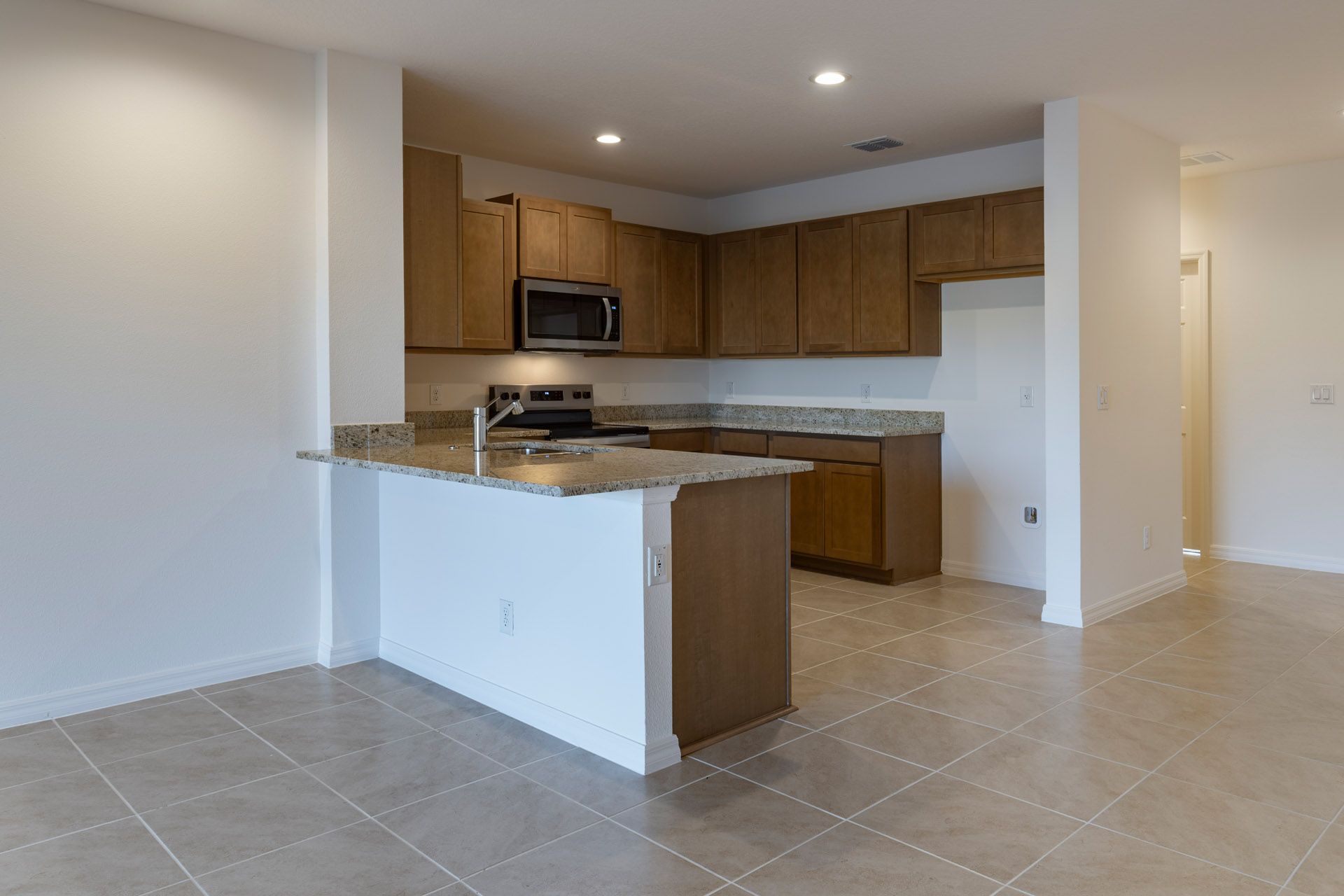 Gourmet Kitchen with Upgraded Features in Central Florida townhome