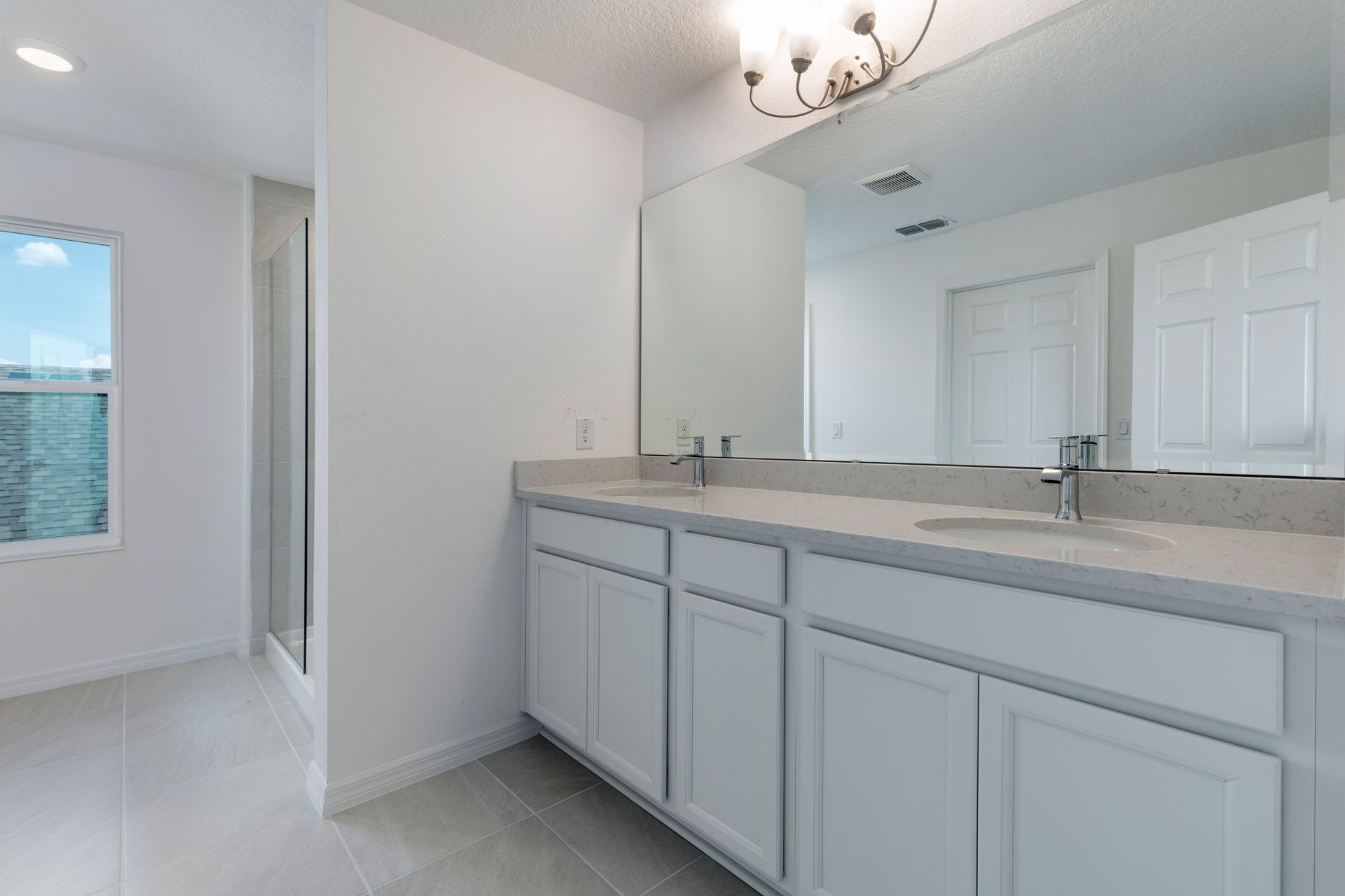 Modern Primary Bathroom with Stylish Features in Central Florida House