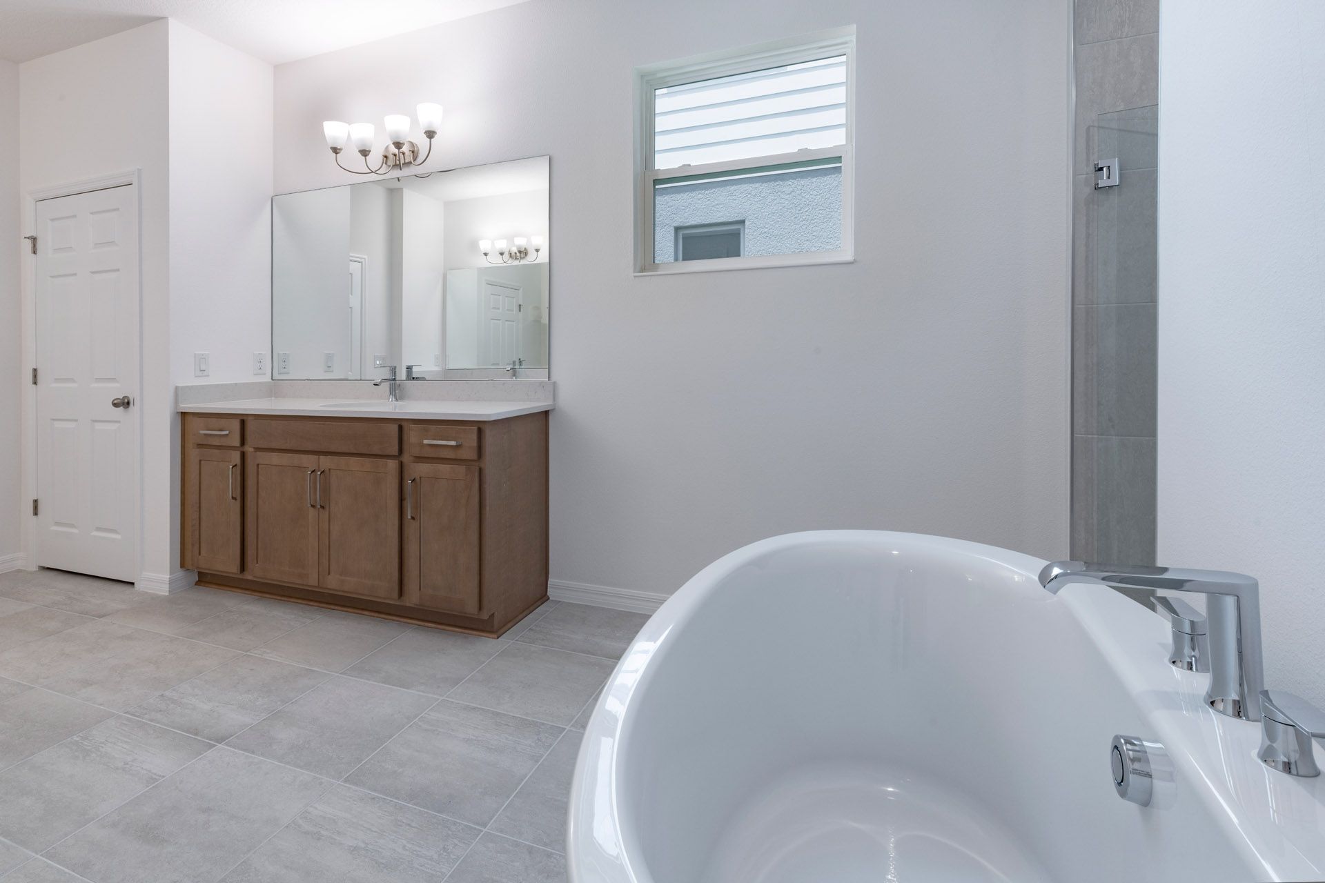 Modern Primary Bathroom with Stylish Features in Central Florida House