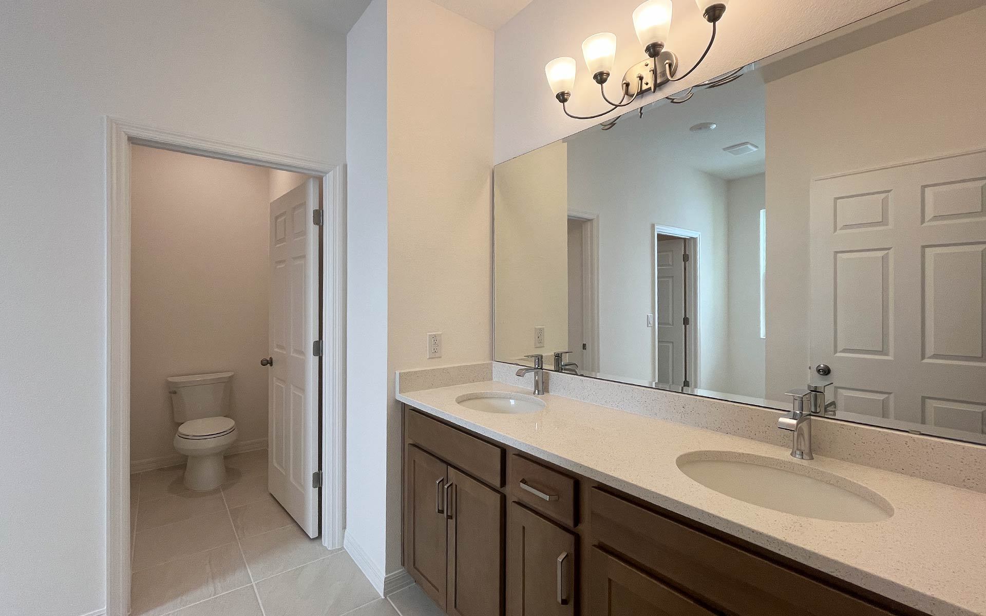 Elegant Primary Bathroom with Upgraded Finishes in Central Florida Home