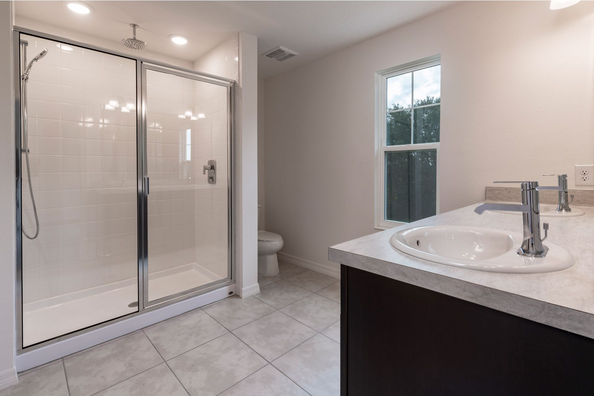 Modern Primary Bathroom with Stylish Features in Central Florida House