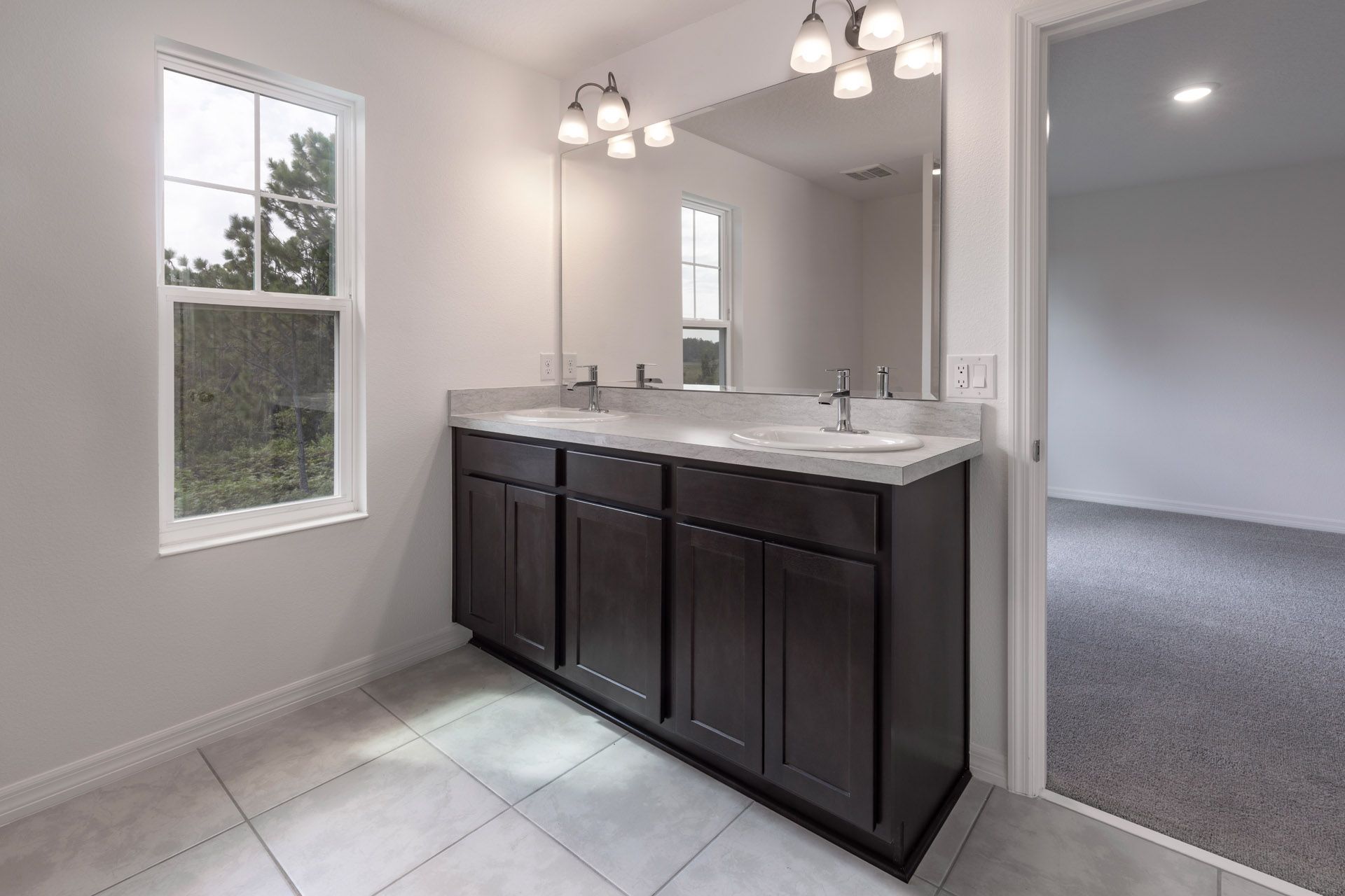 Modern Primary Bathroom with Stylish Features in Central Florida House