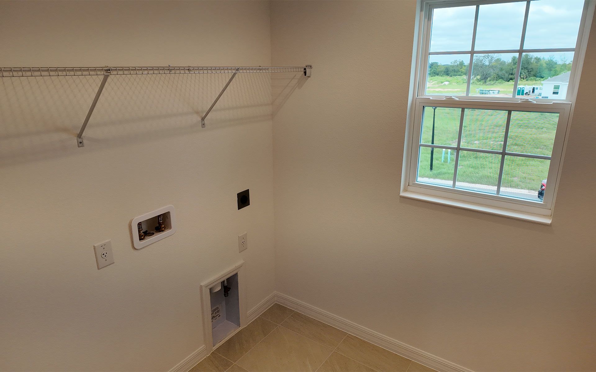 Spacious and Functional Laundry Area in Central Florida House