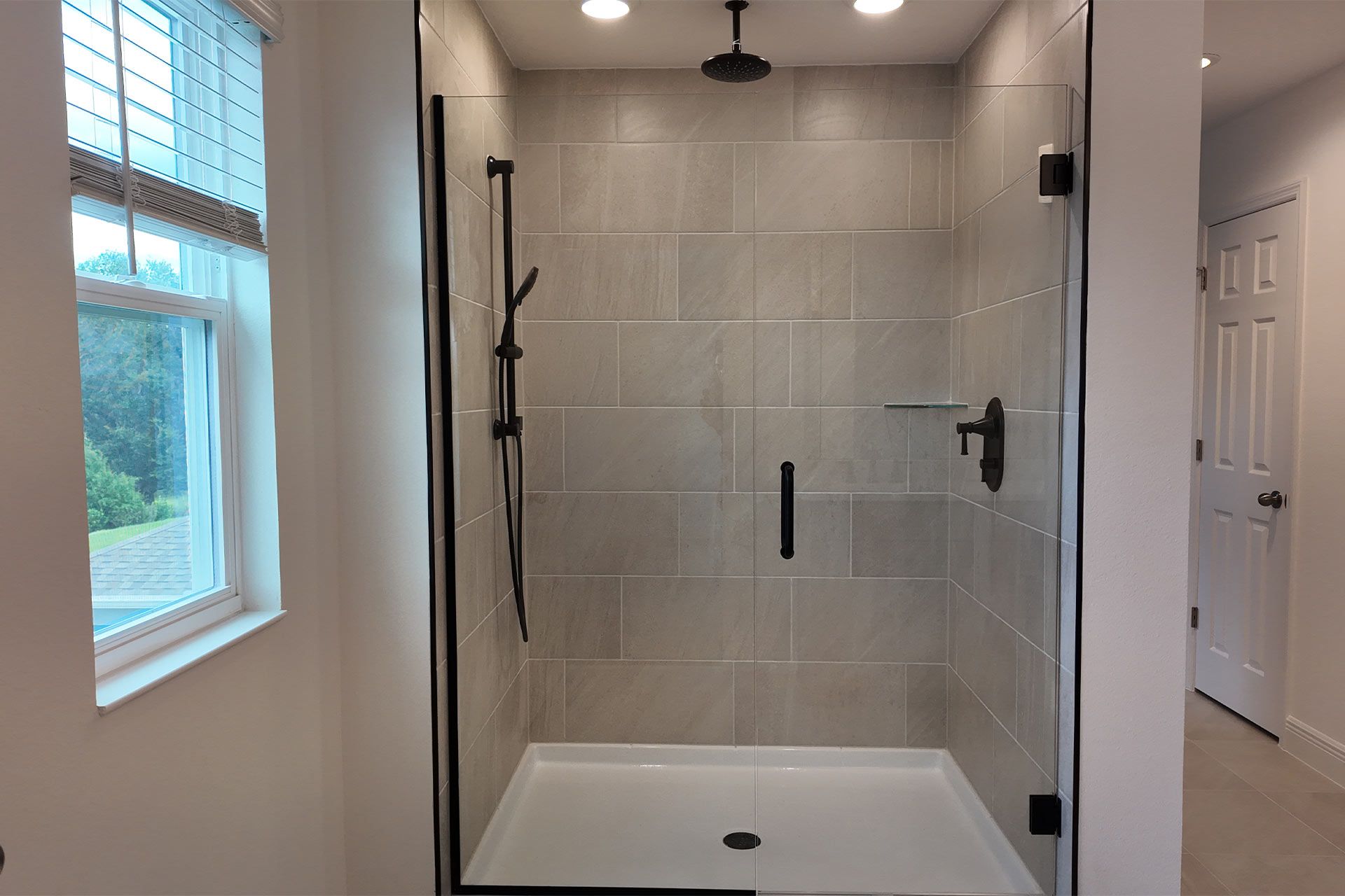 Modern Primary Bathroom with Stylish Features in Central Florida House
