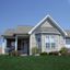 casa en Triou Custom Homes, Inc. por Triou Custom Homes, Inc.