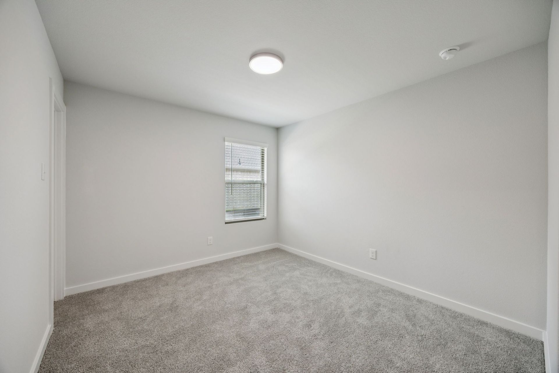 Bedroom in the Hadley home plan by Trophy Signature Homes – REPRESENTATIVE PHOTO