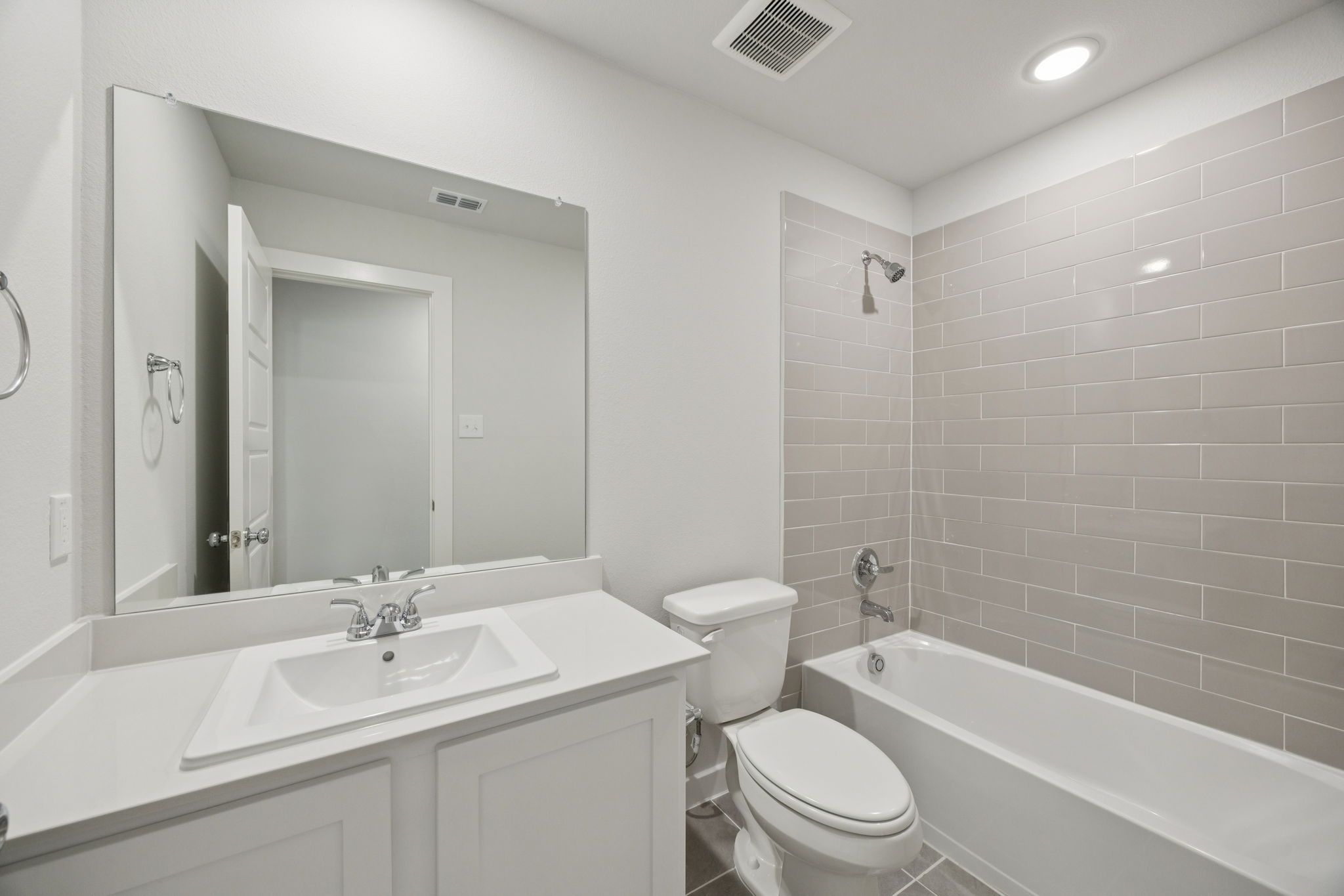 Bathroom in the Hadley home plan by Trophy Signature Homes – REPRESENTATIVE PHOTO