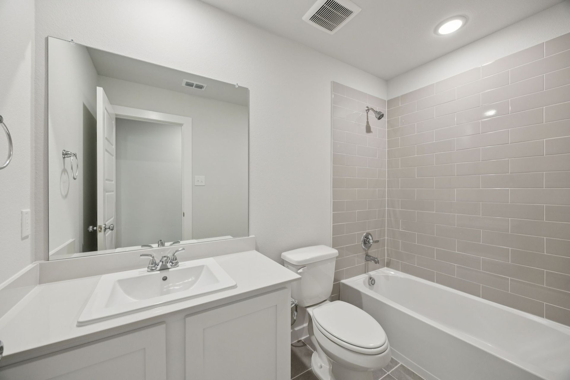 Bathroom in the Hadley home plan by Trophy Signature Homes – REPRESENTATIVE PHOTO
