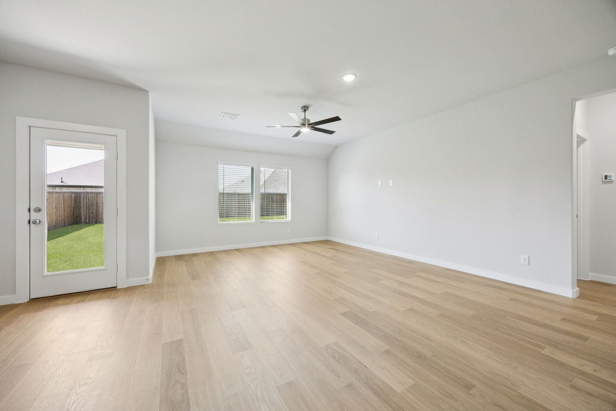 Living Room in the Heisman home plan by Trophy Signature Homes – REPRESENTATIVE PHOTO