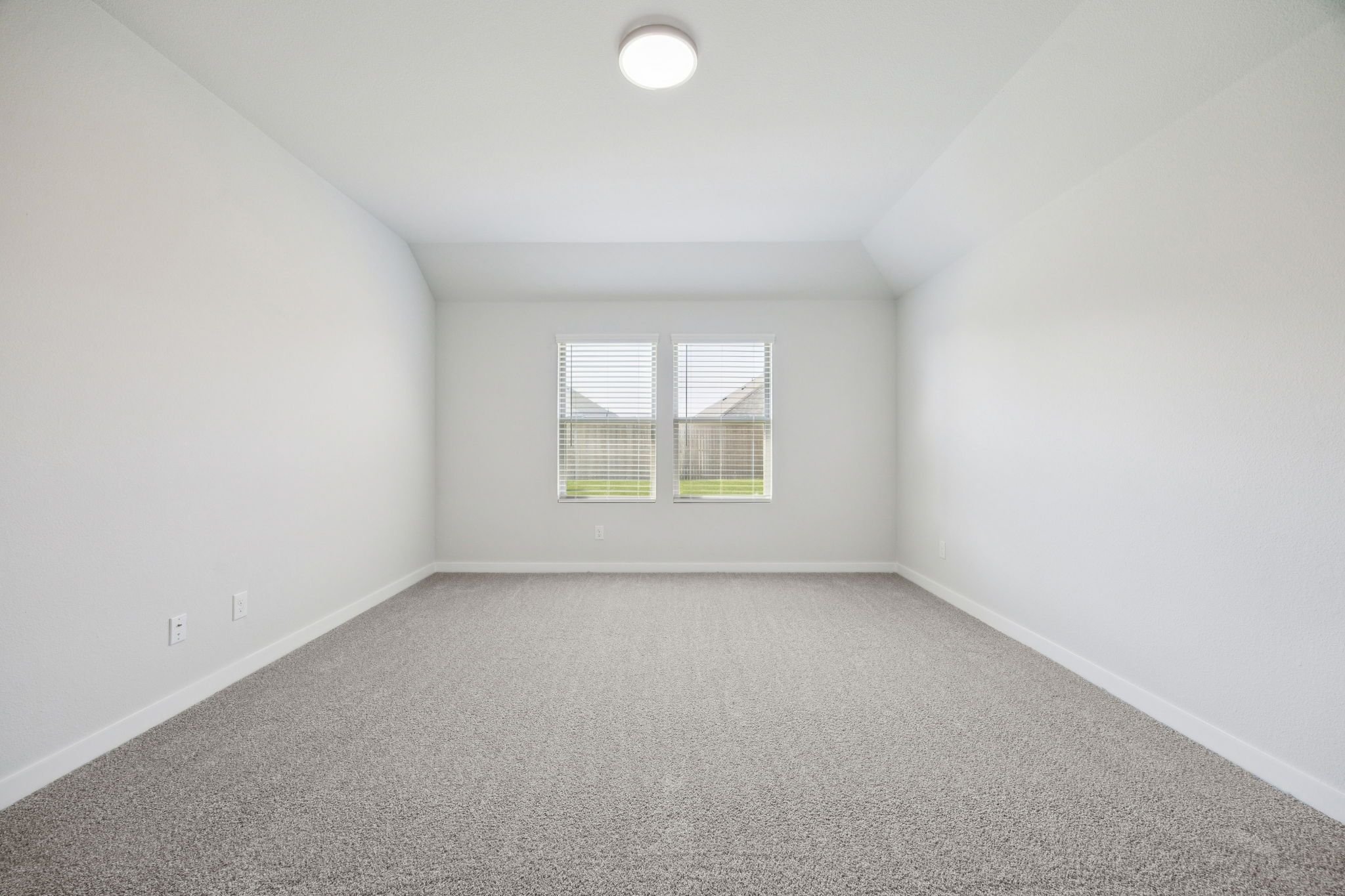 Primary Suite in the Heisman home plan by Trophy Signature Homes – REPRESENTATIVE PHOTO