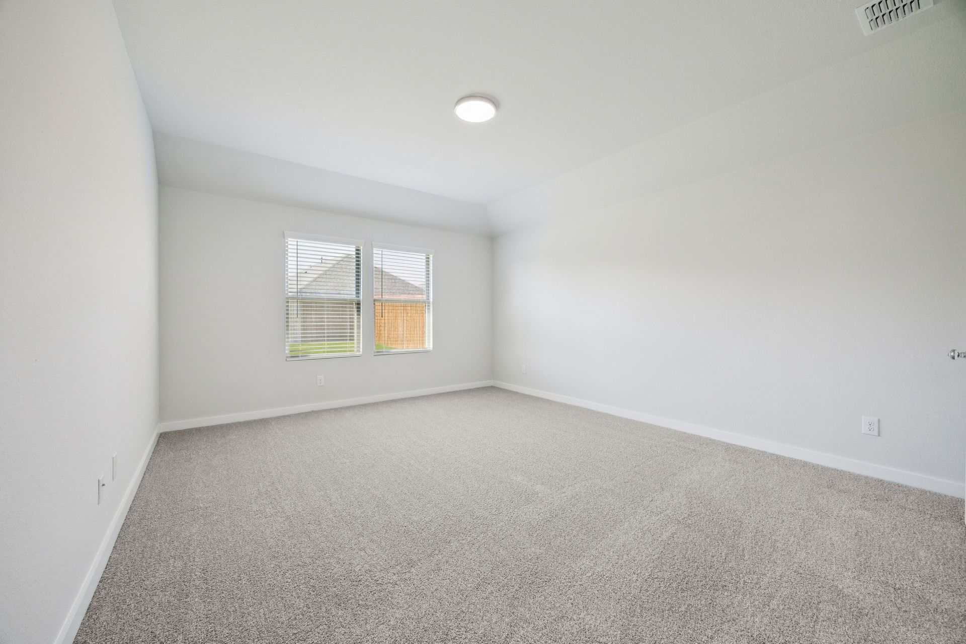Primary Suite in the Heisman home plan by Trophy Signature Homes – REPRESENTATIVE PHOTO
