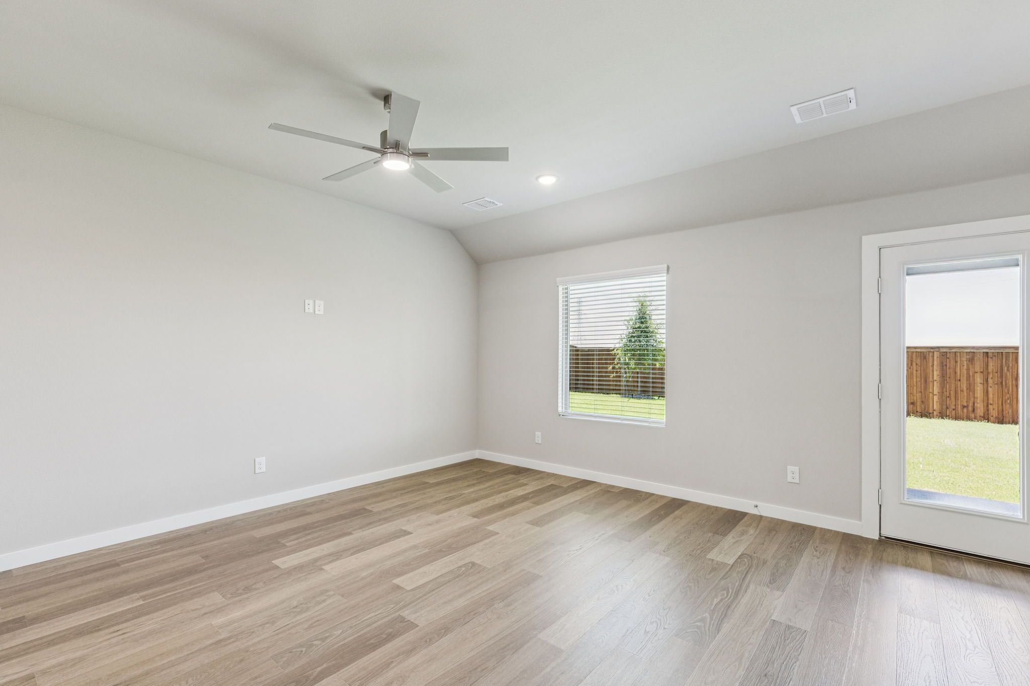 Living Room in the Harper home plan by Trophy Signature Homes – REPRESENTATIVE PHOTO