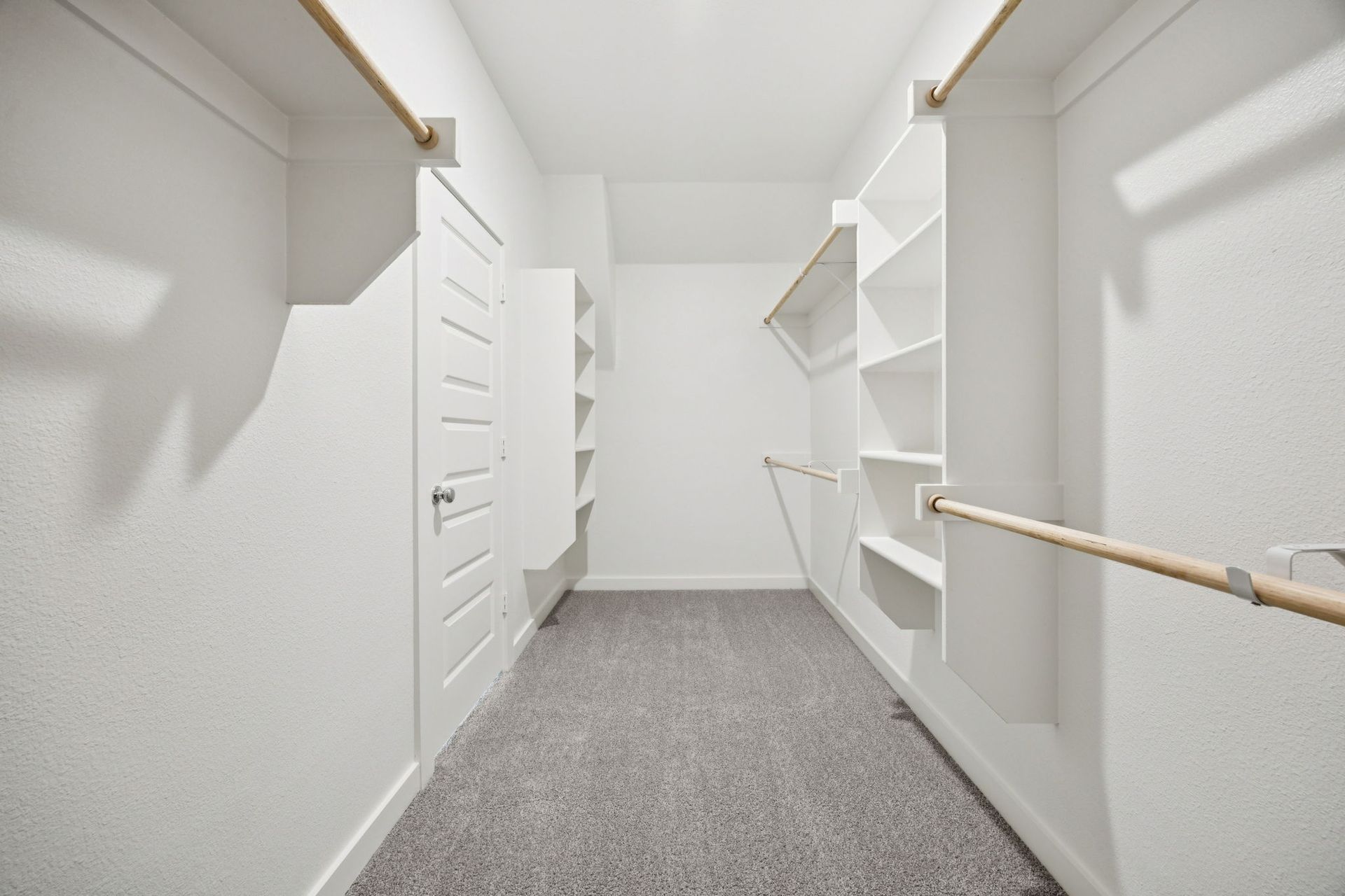 Primary Closet in the Heisman home plan by Trophy Signature Homes – REPRESENTATIVE PHOTO