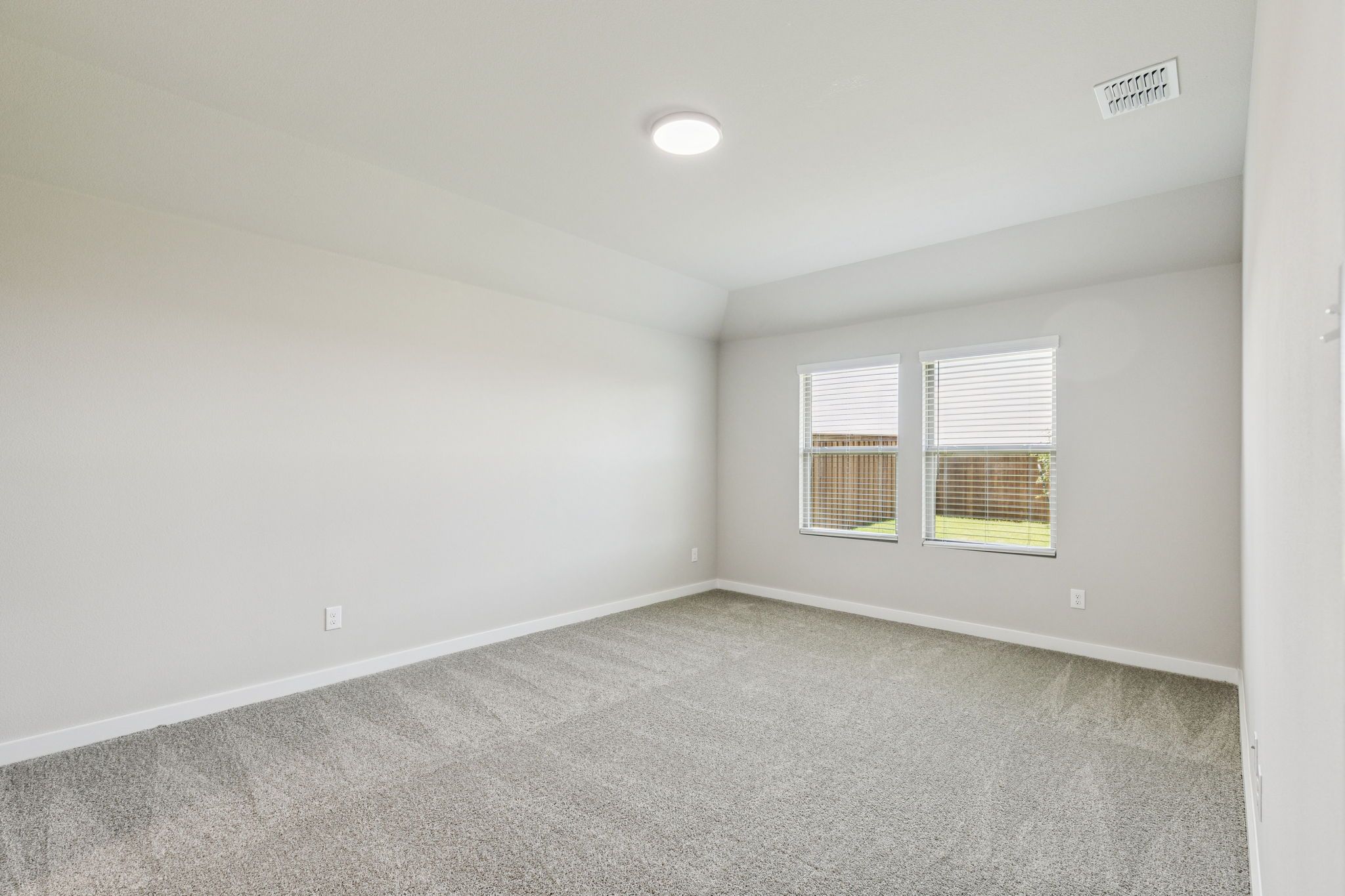 Primary Suite in the Harper home plan by Trophy Signature Homes – REPRESENTATIVE PHOTO