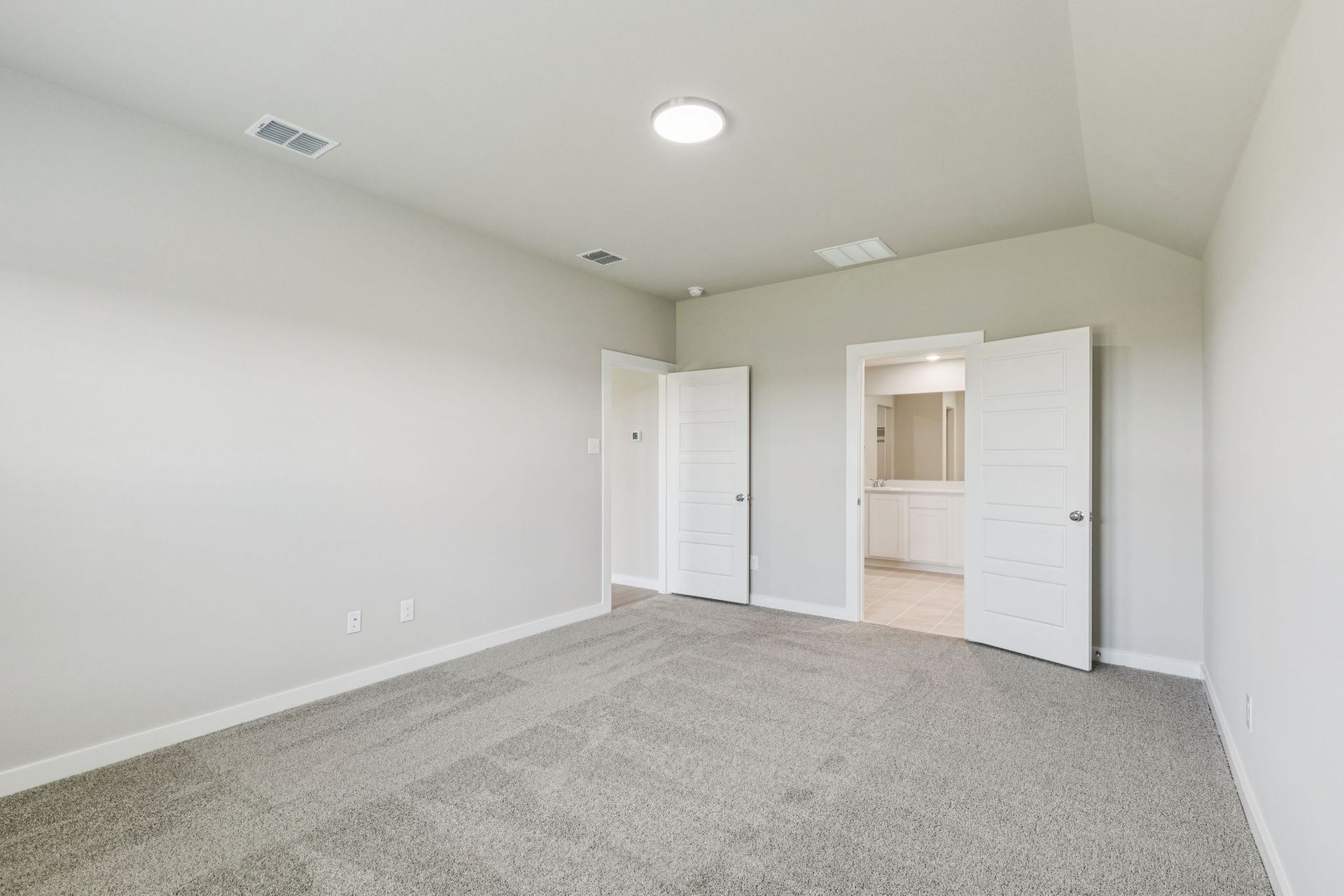 Primary Suite in the Harper home plan by Trophy Signature Homes – REPRESENTATIVE PHOTO