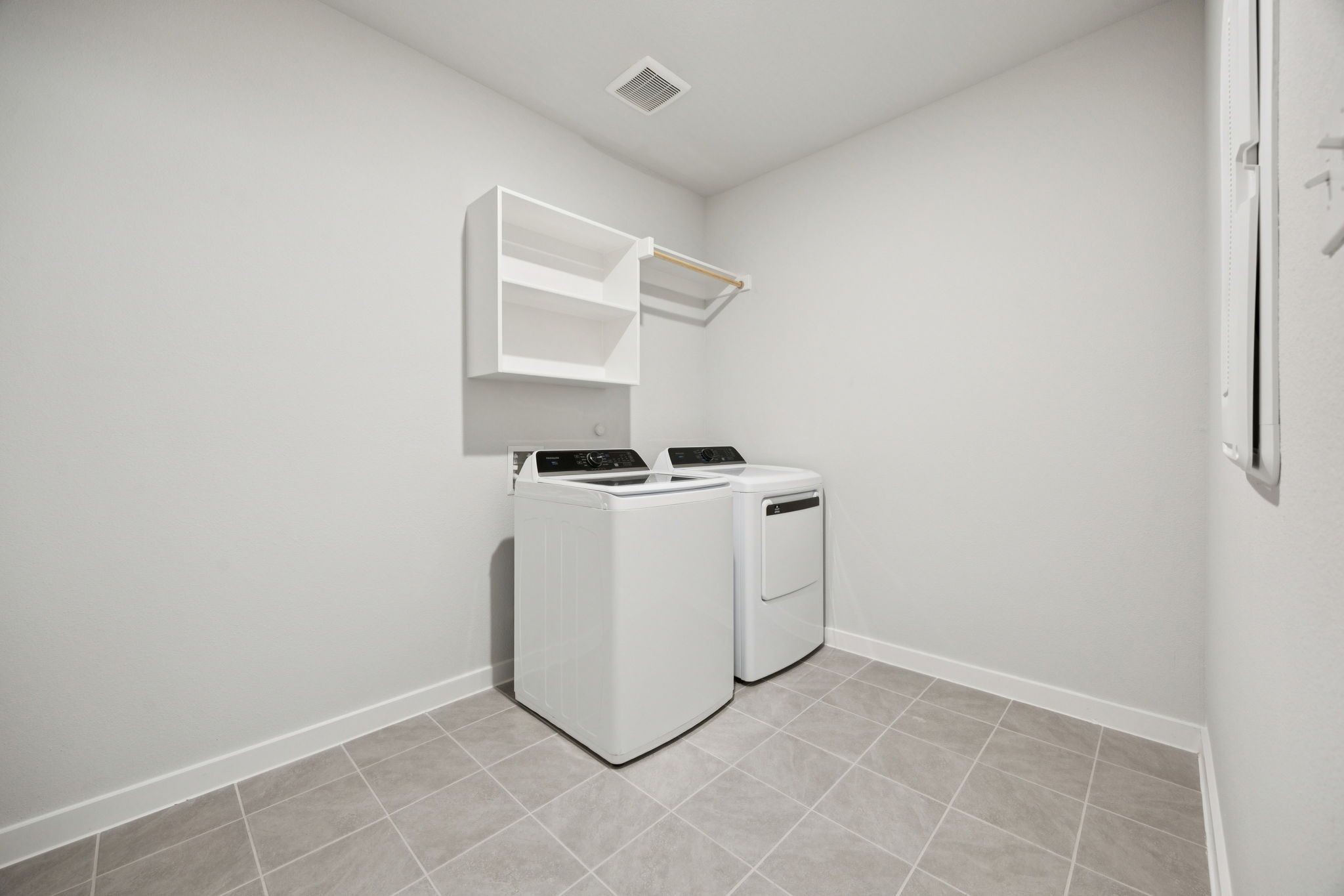 Utility Room in the Heisman home plan by Trophy Signature Homes – REPRESENTATIVE PHOTO