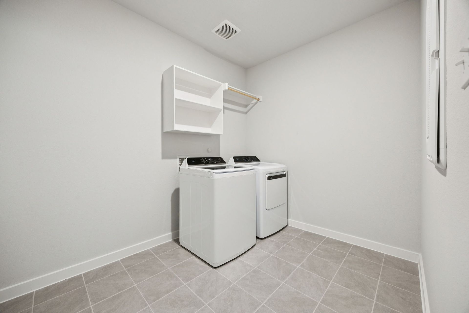 Utility Room in the Heisman home plan by Trophy Signature Homes – REPRESENTATIVE PHOTO
